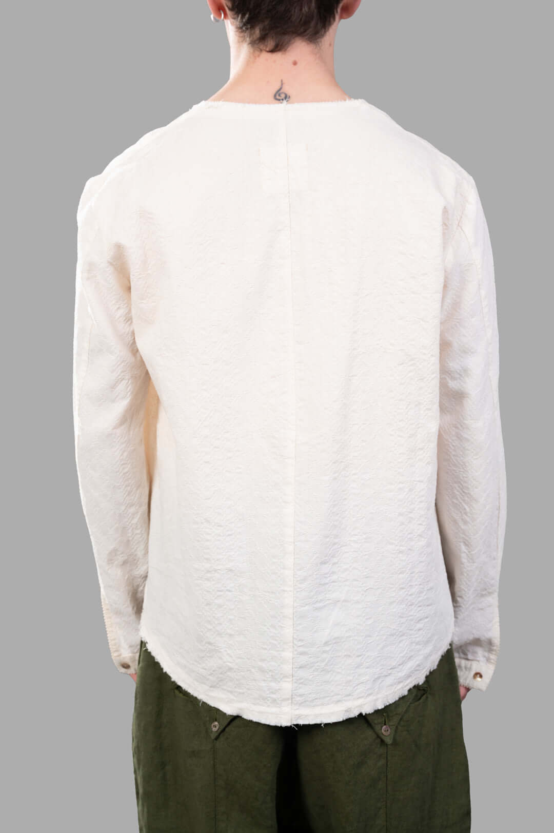 Marc Point V-neck Blouse in ecru, showcasing back view with textured cotton fabric and relaxed fit for comfort.