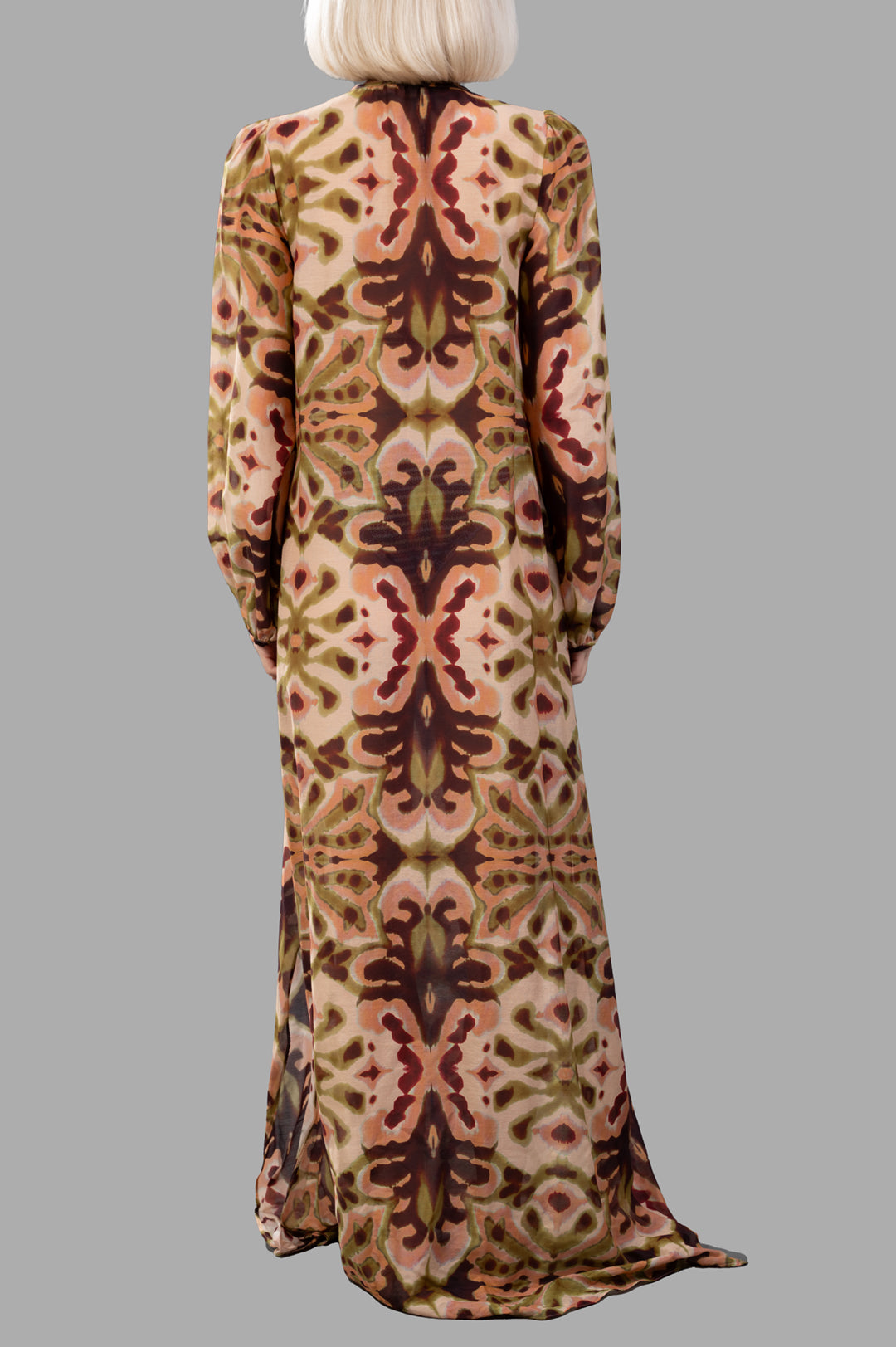 Anjuna Abstract-print Maxi Dress shown from the back, featuring a colorful floral pattern and elegant long sleeves.