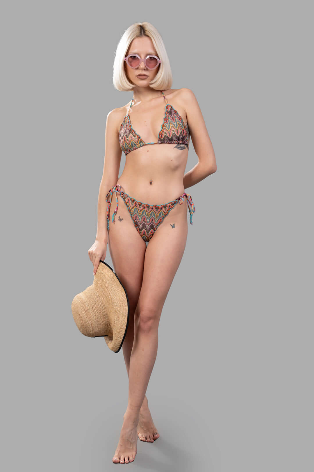 Anjuna Zig Zag Wavy Triangle Bikini Set on model, featuring multicolor zigzag pattern with tie-side bottoms, front view.