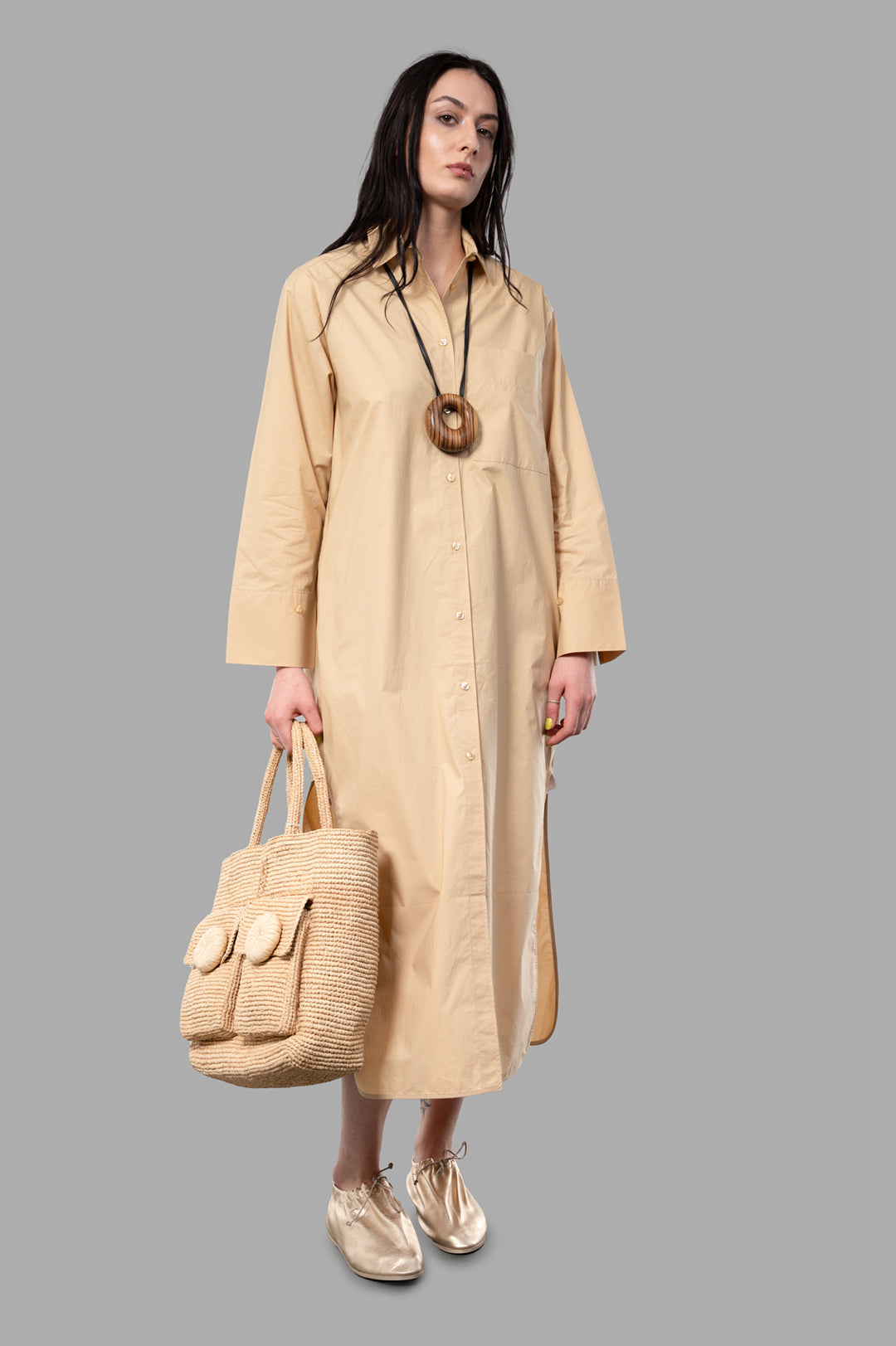 By Malene Birger Perros Organic Cotton Dress in beige, on-model front view, styled with woven tote and flats.