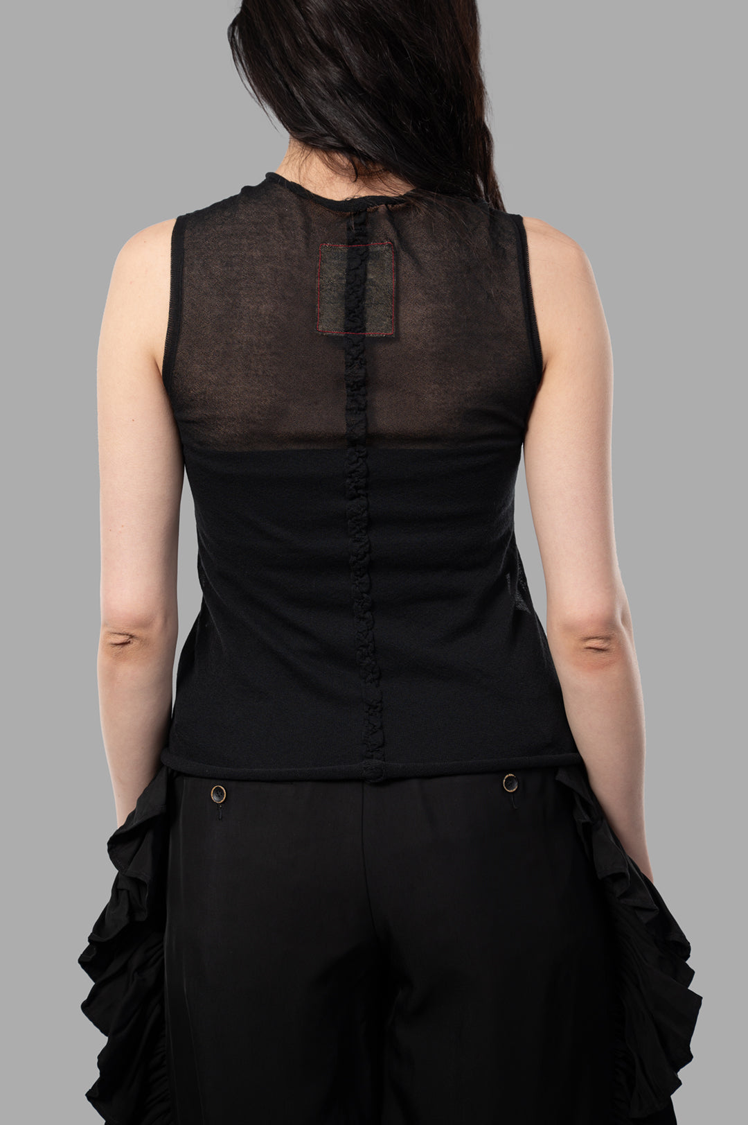 Uma Wang Semi-transparent Top displayed from the back, featuring delicate texture and a button detail in premium black.