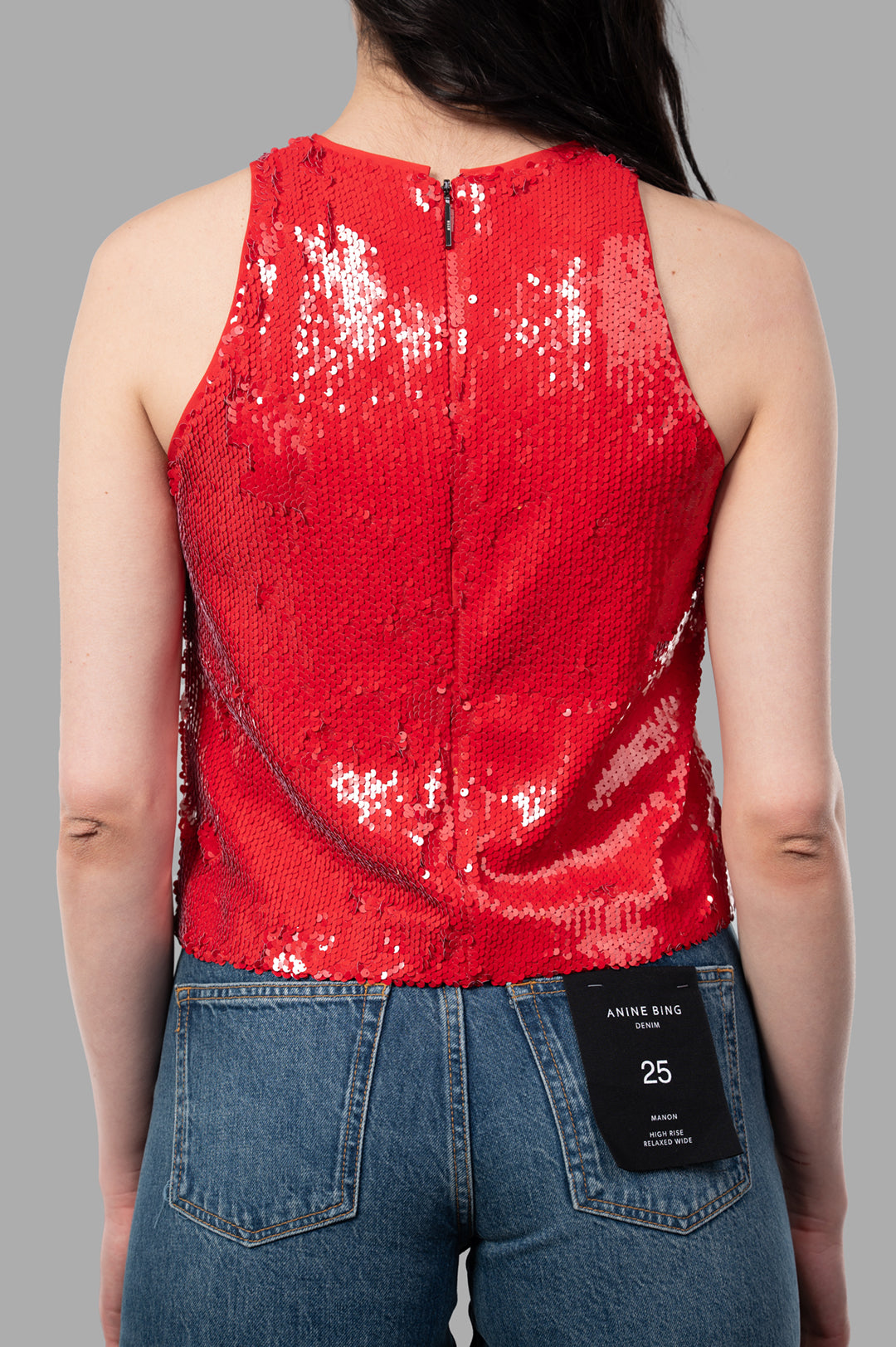 MSGM Red Sequin Top featuring a close-up view of the back, showcasing shiny sequins and a zipper detail.