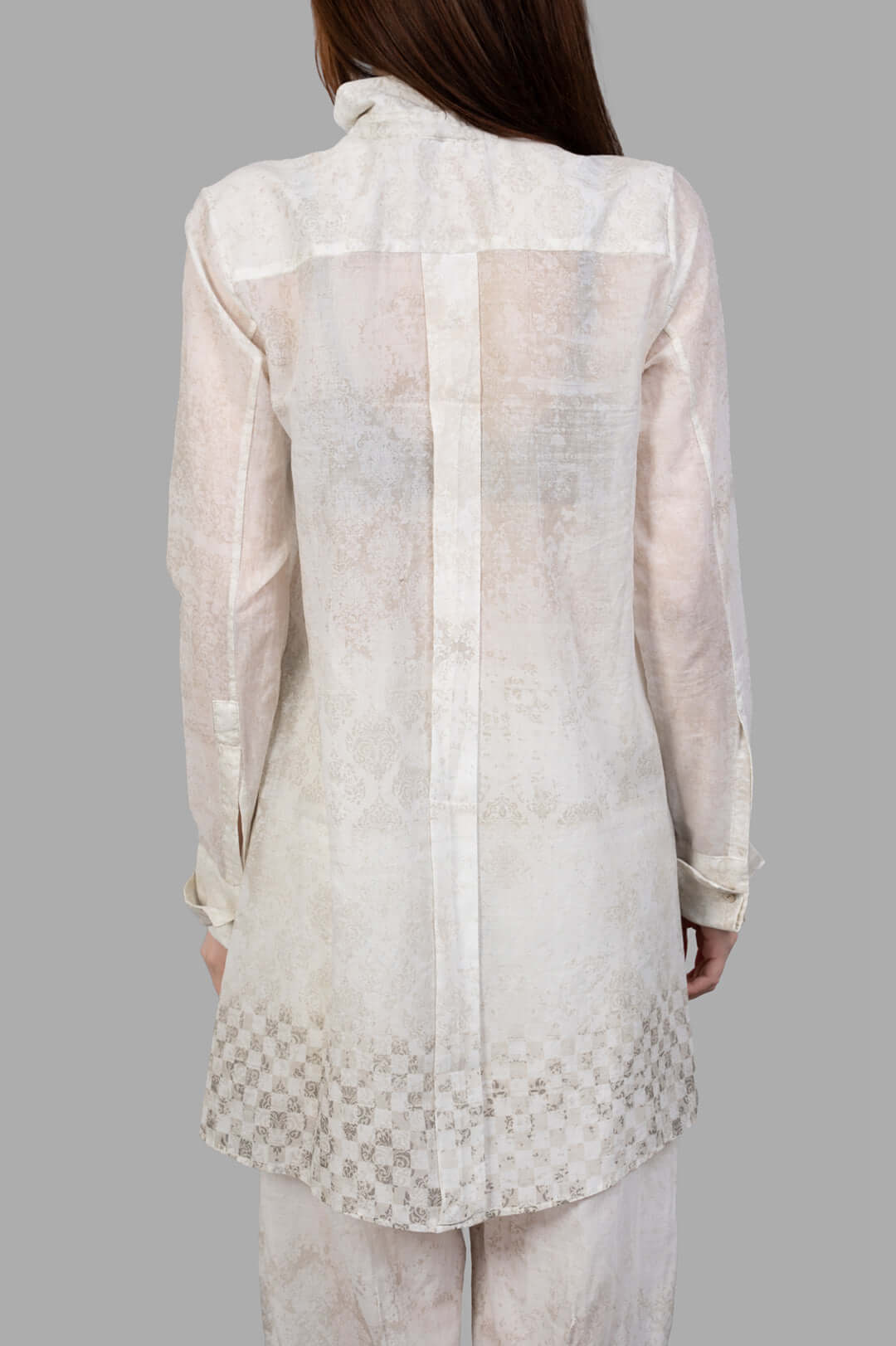 Masnada Plaster Shirt, ecru, back view showcasing its loose fit, subtle graphic details, and translucent cotton fabric.
