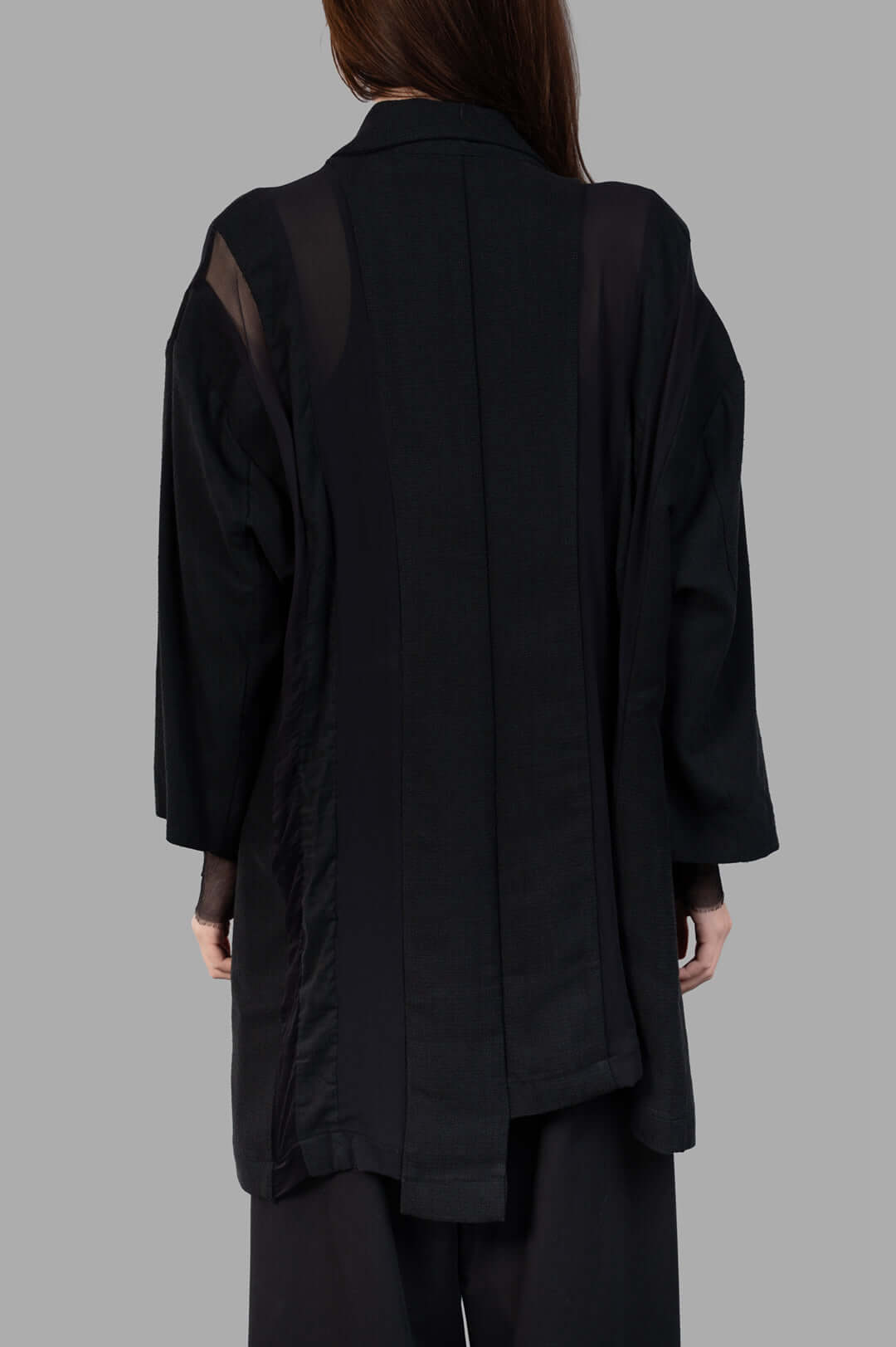 Giovanni Cavagna Paneled Blazer showcasing back detail with a blend of cotton and silk, offering a unique textured design.