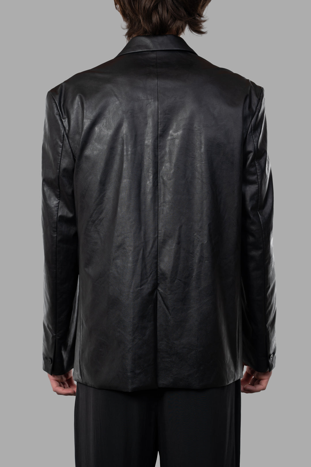 Vein Synthetic Leather Jacket, back view showcasing high-quality black polyurethane material and sleek design.