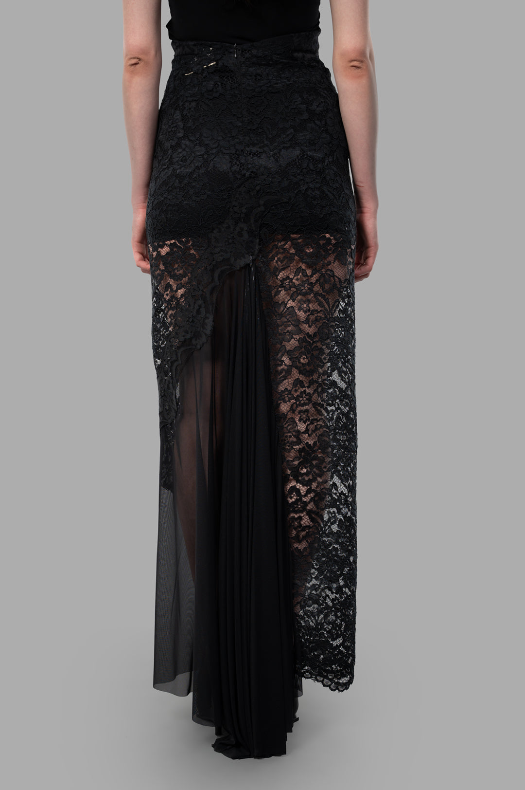 Sehnsucht Atelier Lace Maxi Skirt, black semi-transparent lace, back view showcasing the flowing design and texture details.