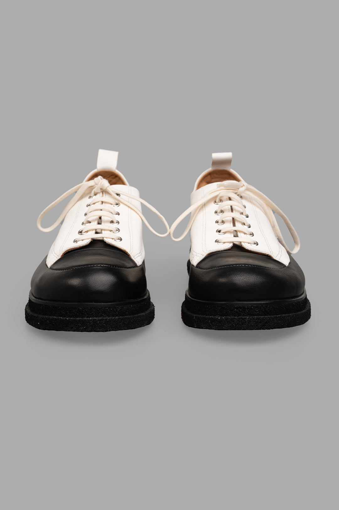 Shoto Color-block Shoes in White/Black, showcasing unique leather detail and artisanal craftsmanship from Italy.