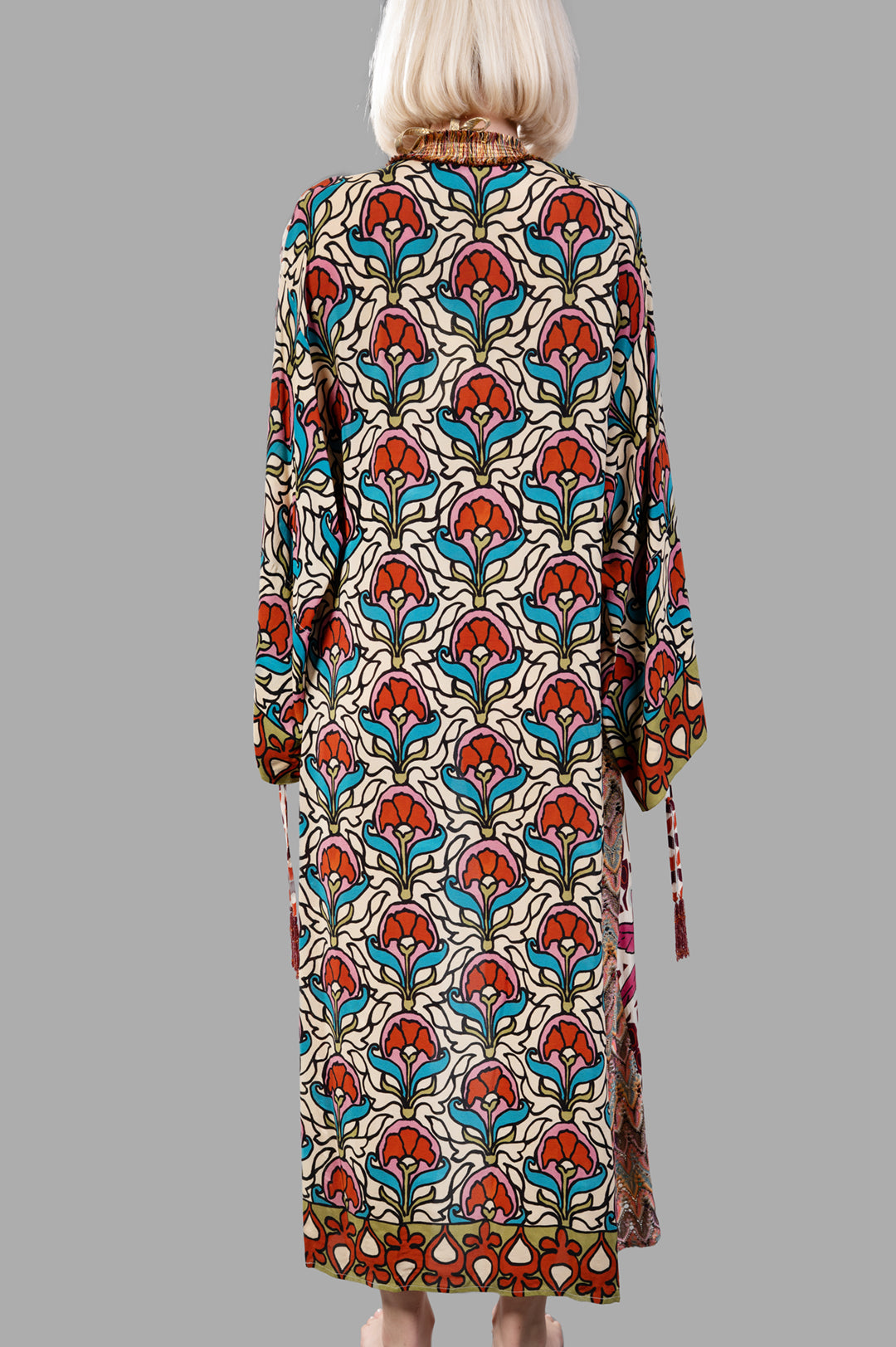 Anjuna Embellished Printed Crepe Kaftan shown from the back, featuring vibrant floral design and flowing silhouette.