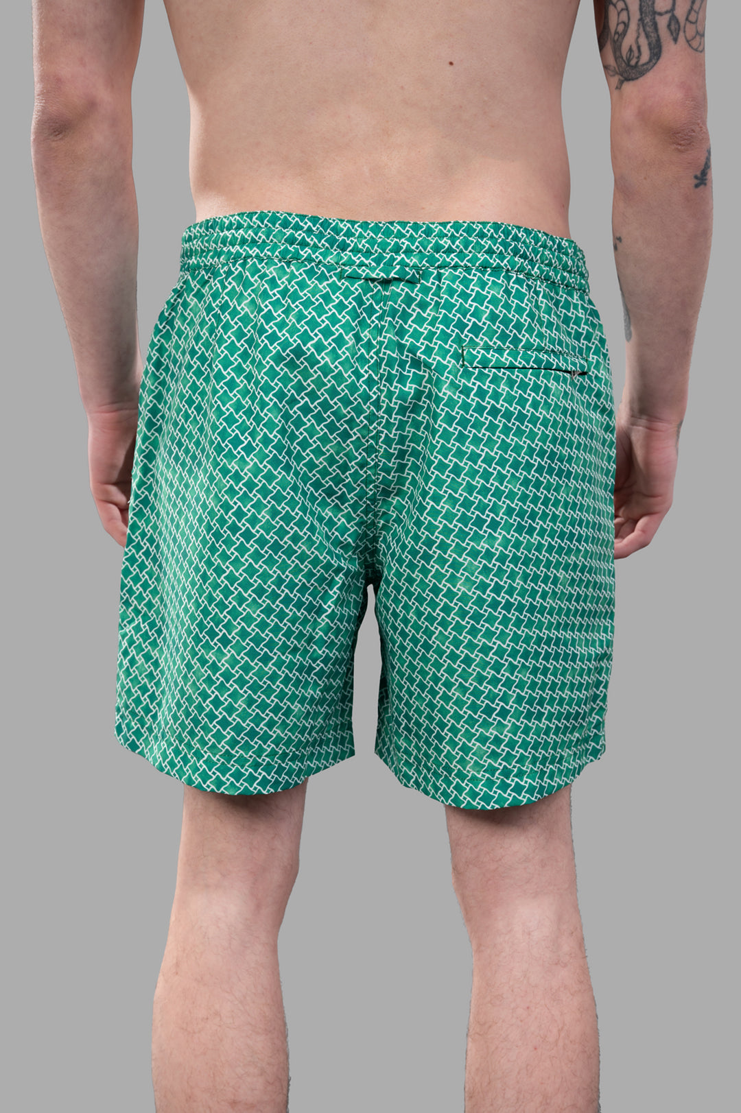 Orlebar Brown Drawcord Swim Shorts in Green, back view showcasing the relaxed fit and stylish half-elasticated waistband.