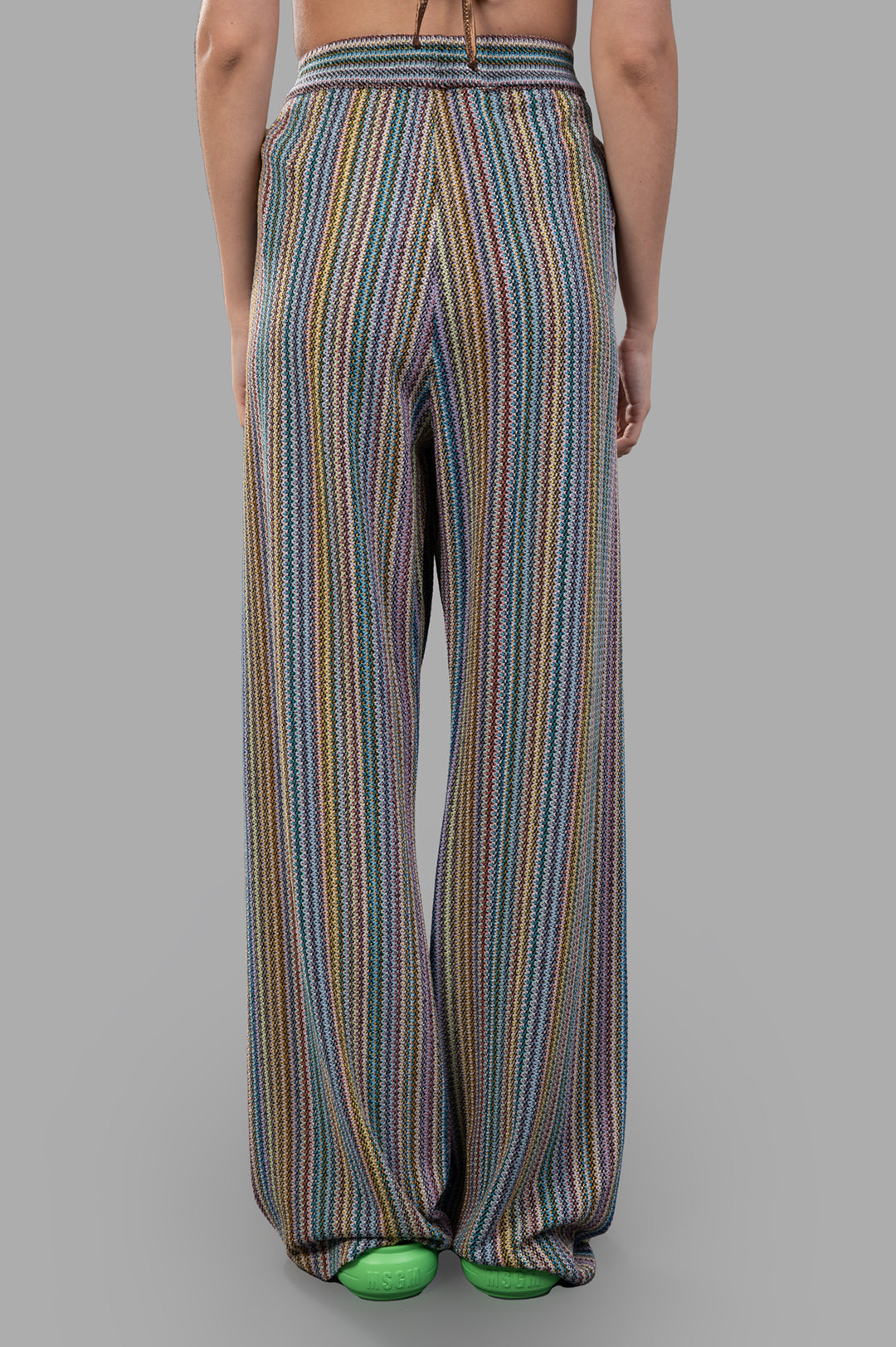 Anjuna Striped Knit Trousers featuring a multicolor design, shown from the back on a model, highlighting wide-leg fit and.