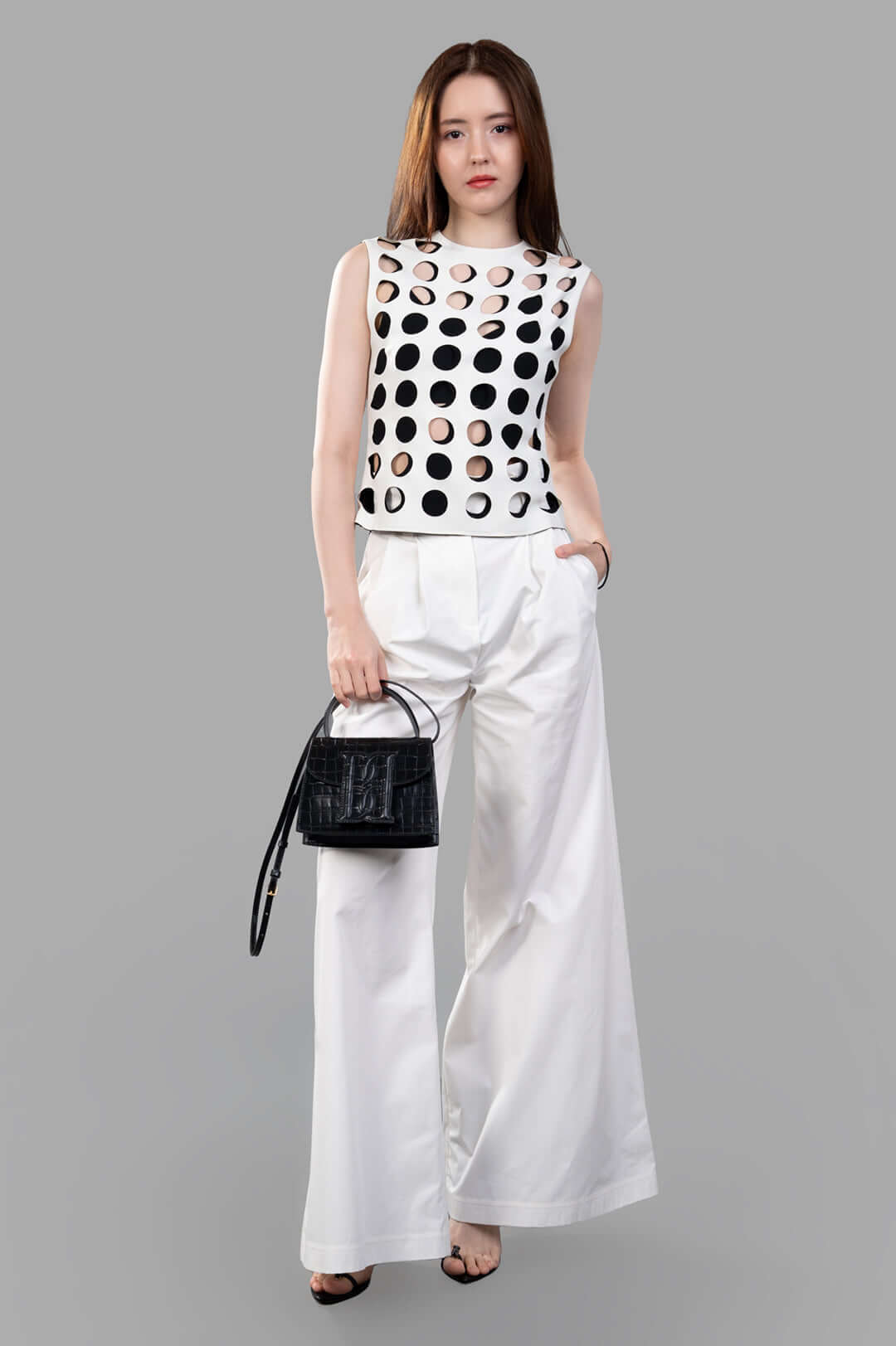 A.W.A.K.E. MODE Top with Layered Holes, sleeveless, front view. White with cut-out detailing, round neckline.