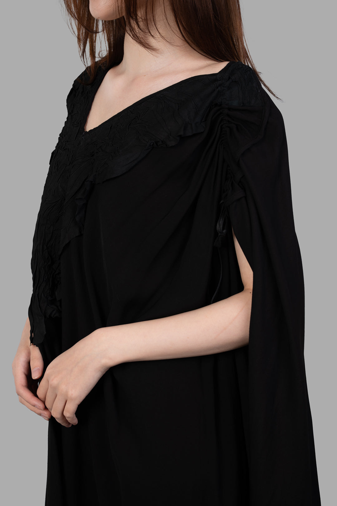 Isaac Sellam. Leather-detail Dress featuring a textured V-neck and stylish cap sleeves, showcasing black viscose and leather.