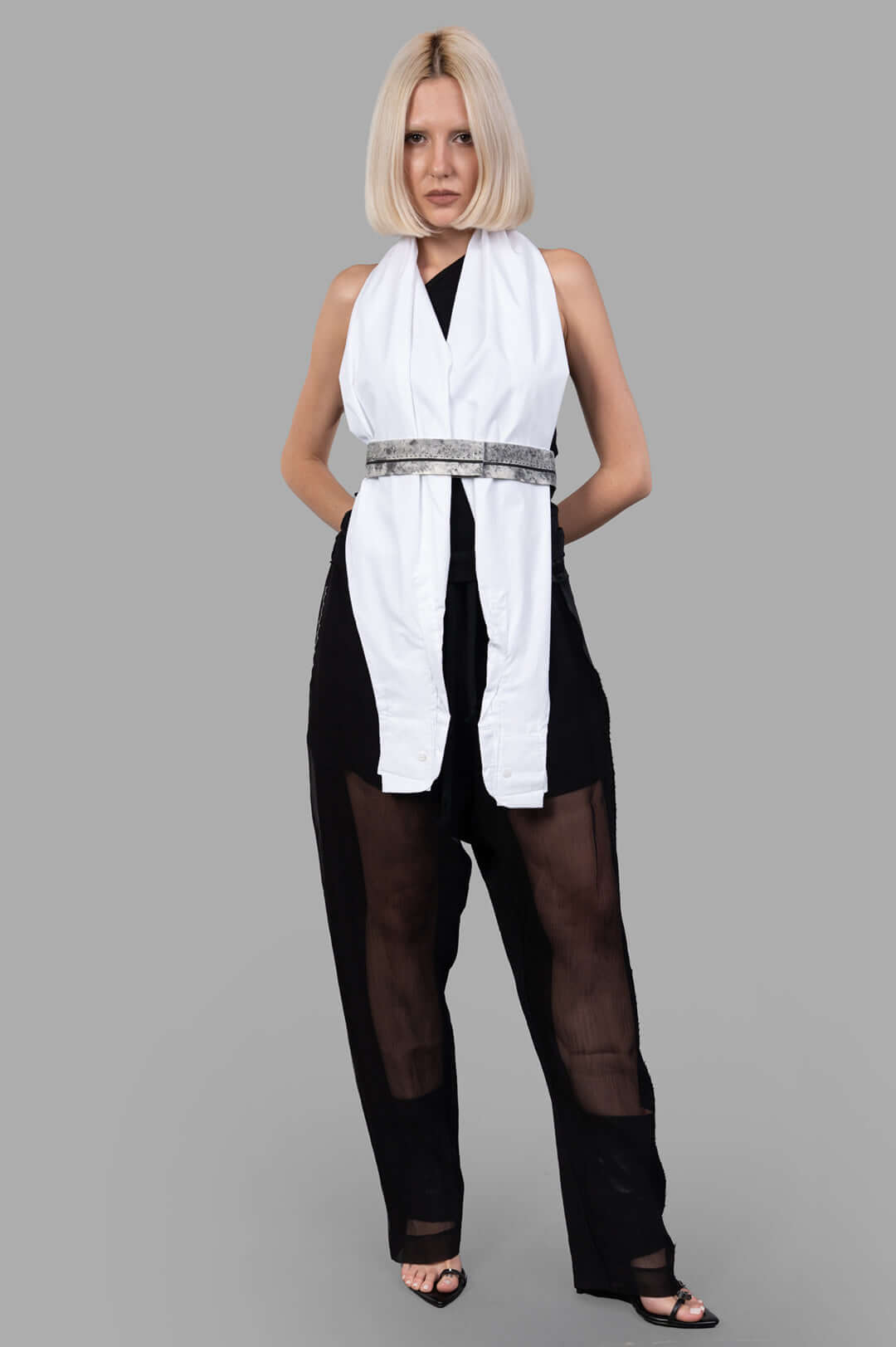 Giovanni Cavagna white Sleeve Top worn as elegant scarf, front view on model, showcasing innovative fashion design.