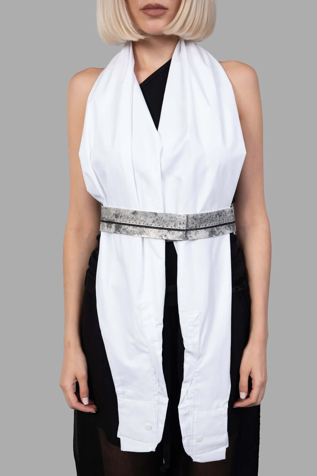 Giovanni Cavagna Sleeve Top features a white design on-model, doubled as an elegant scarf with a unique belt detail.