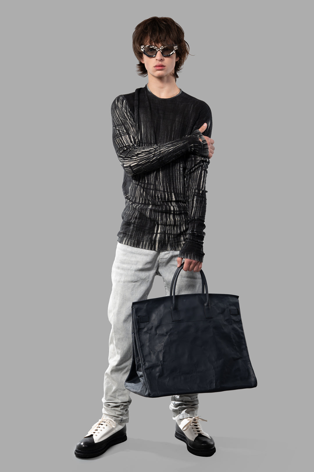 MD 75 Ribbed Sweater with Stripes, front view on model, grey cotton, showcasing sleek, subtle avant-garde design.