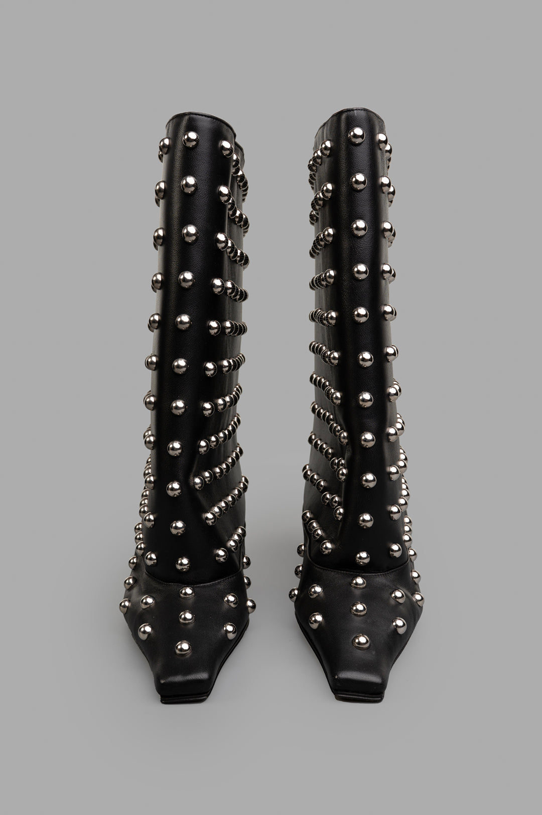 A.W.A.K.E. MODE. Black Cylinder Boots with studded details, mid-calf height, pointed toe, and refined kitten heel.