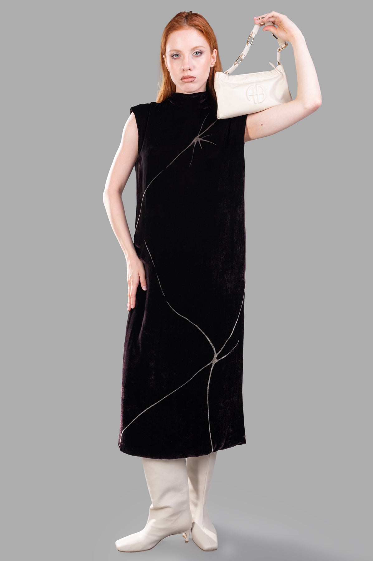 Gentry Portofino Velvet Dress in burgundy, front view on model, featuring cap sleeves and minimal graphic print.
