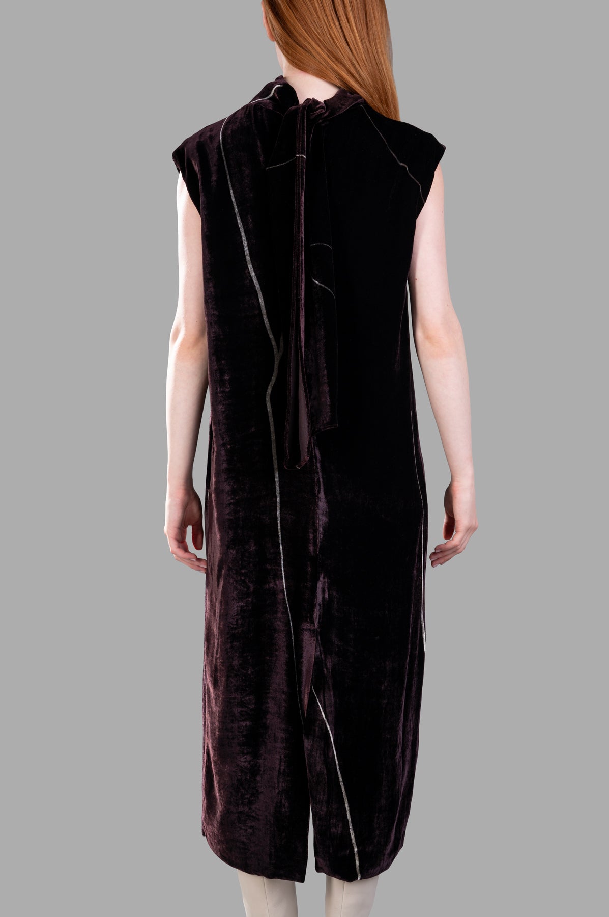 Gentry Portofino Velvet Dress showcasing the elegant back design with subtle graphic print and cap sleeves in burgundy.