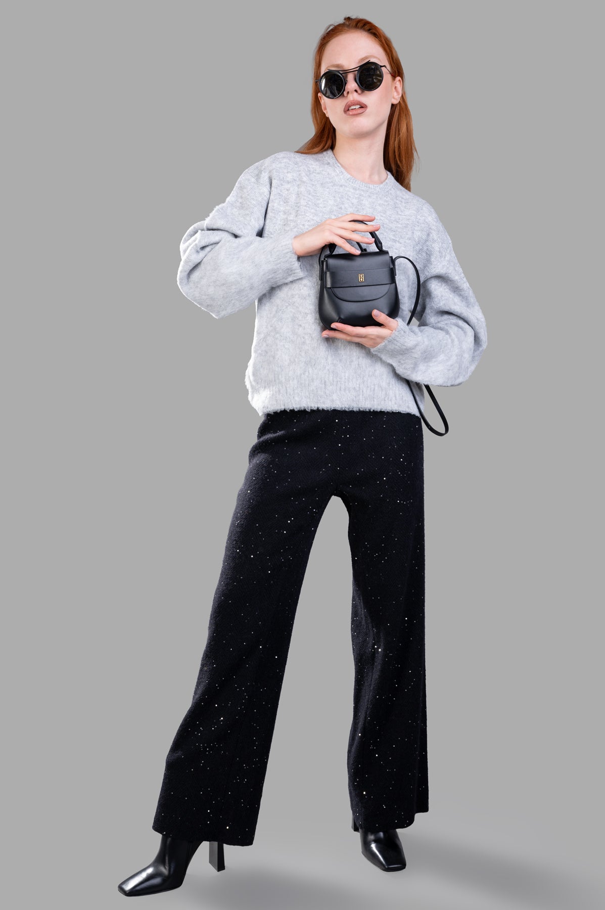 Helmut Lang Brushed Apex Sweater front view on-model, styled with sunglasses and handbag.