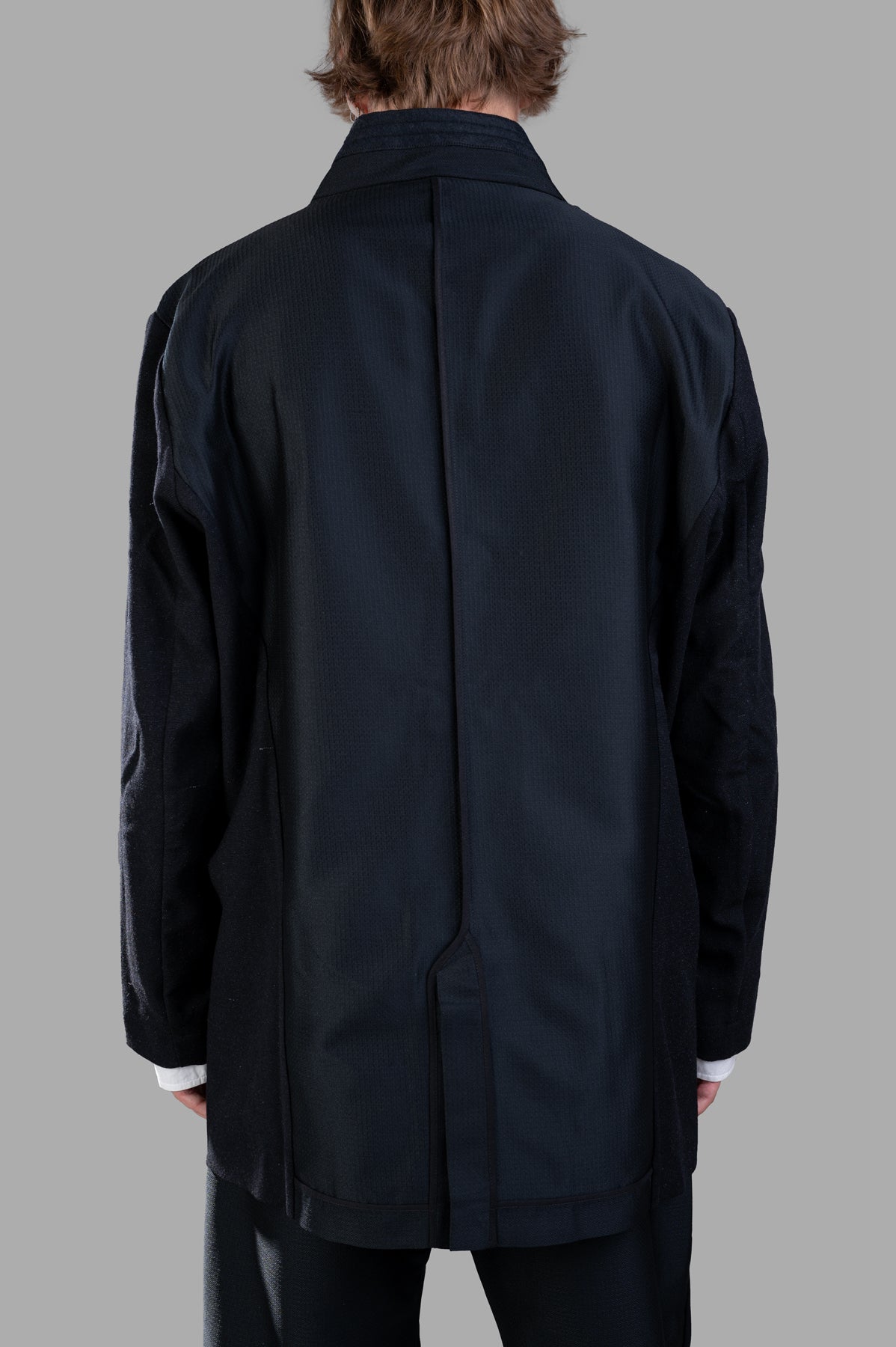 Giovanni Cavagna Single-breasted Blazer, back view showcasing oversized silhouette and high-quality wool blend in black.