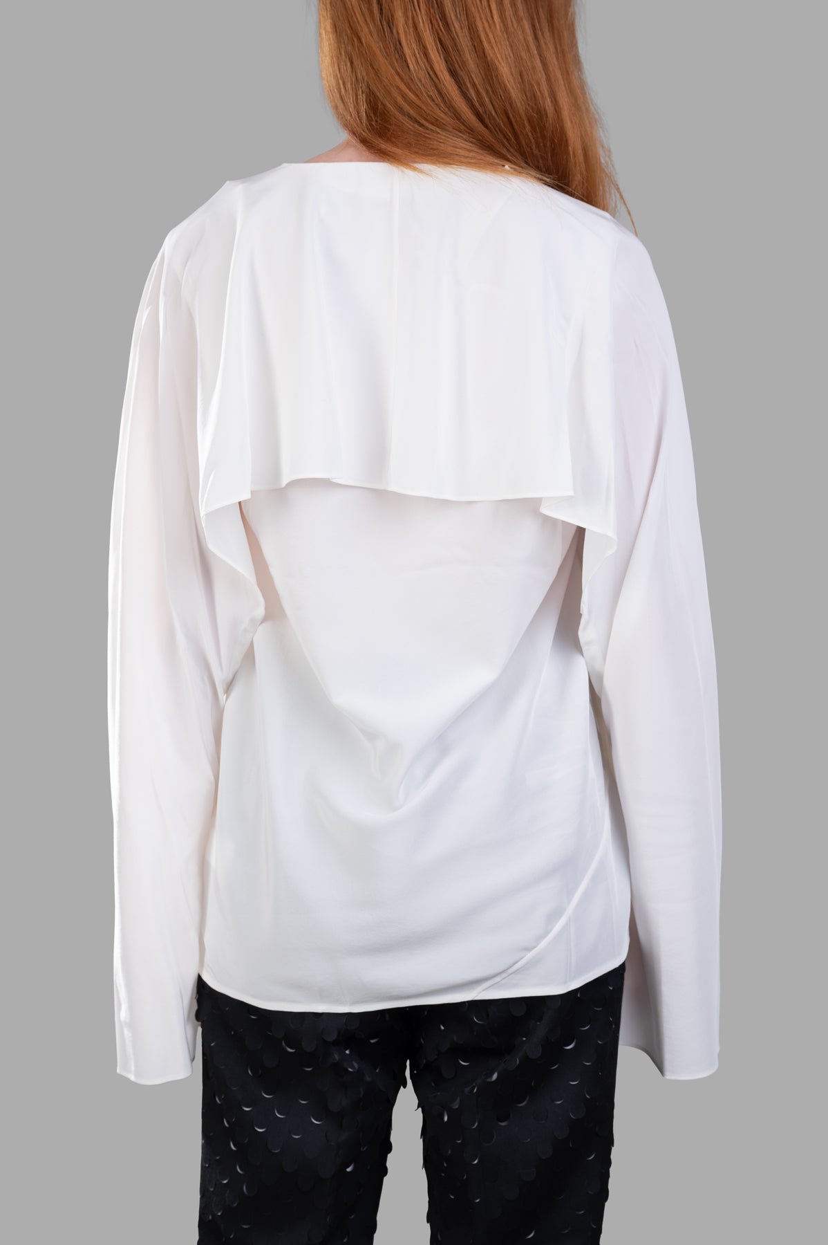 Helmut Lang Scarf Blouse in white silk crepe de chine, highlighting the elegant drape of the sleeves from a side perspective.