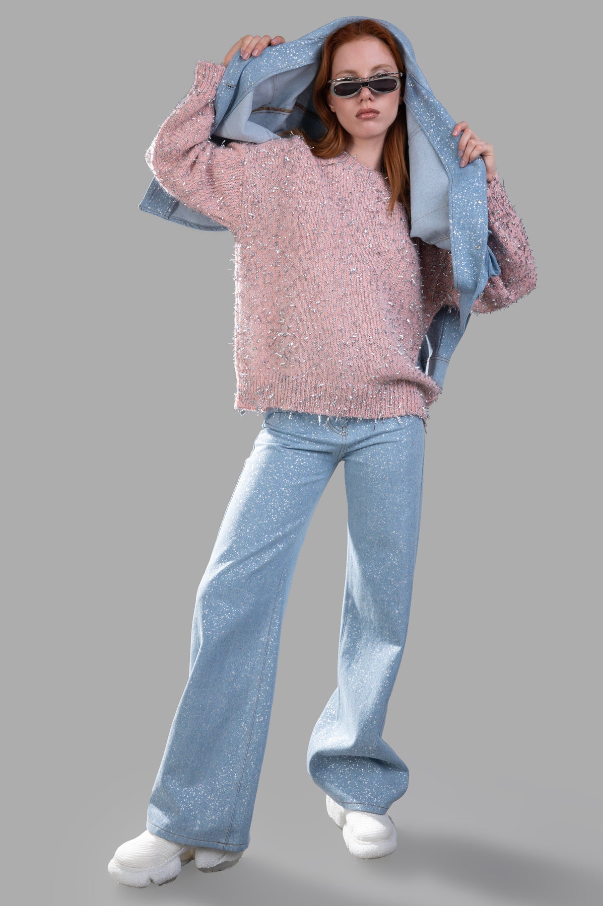 MSGM Lamé Thread Sweater in pink; front view on-model. Features frayed silver ribbon weave, ribbed accents; styled with.