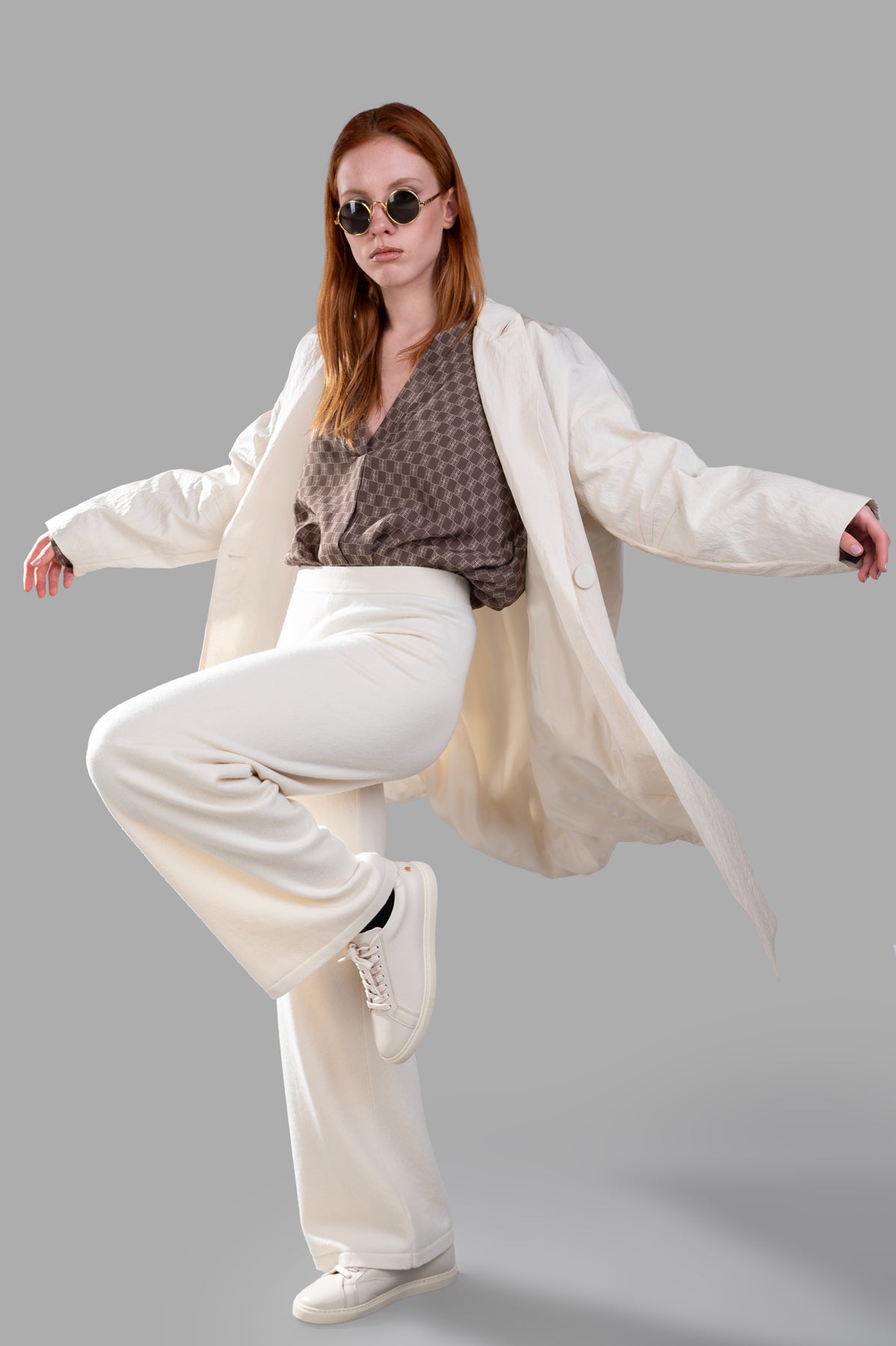 Gentry Portofino Cream Oversized Coat on model, showcasing textured design and single-breasted style, perfect for layering.