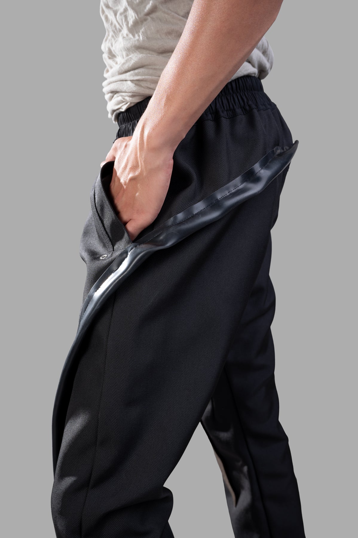 Rick Owens Porterville Mastodon Megacargo Pants styled on a model, showcasing the elasticized waistband and cargo pockets.