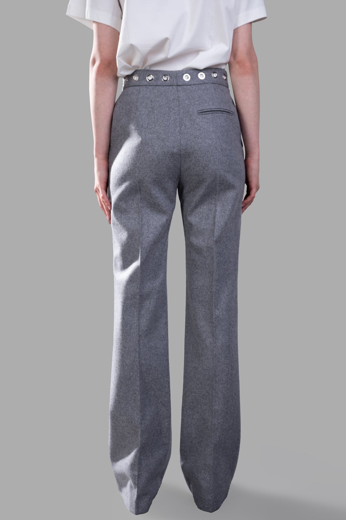 MSGM Wool Pants With Studs in grey, showcasing straight-leg fit and decorative studded waistband from a rear view.