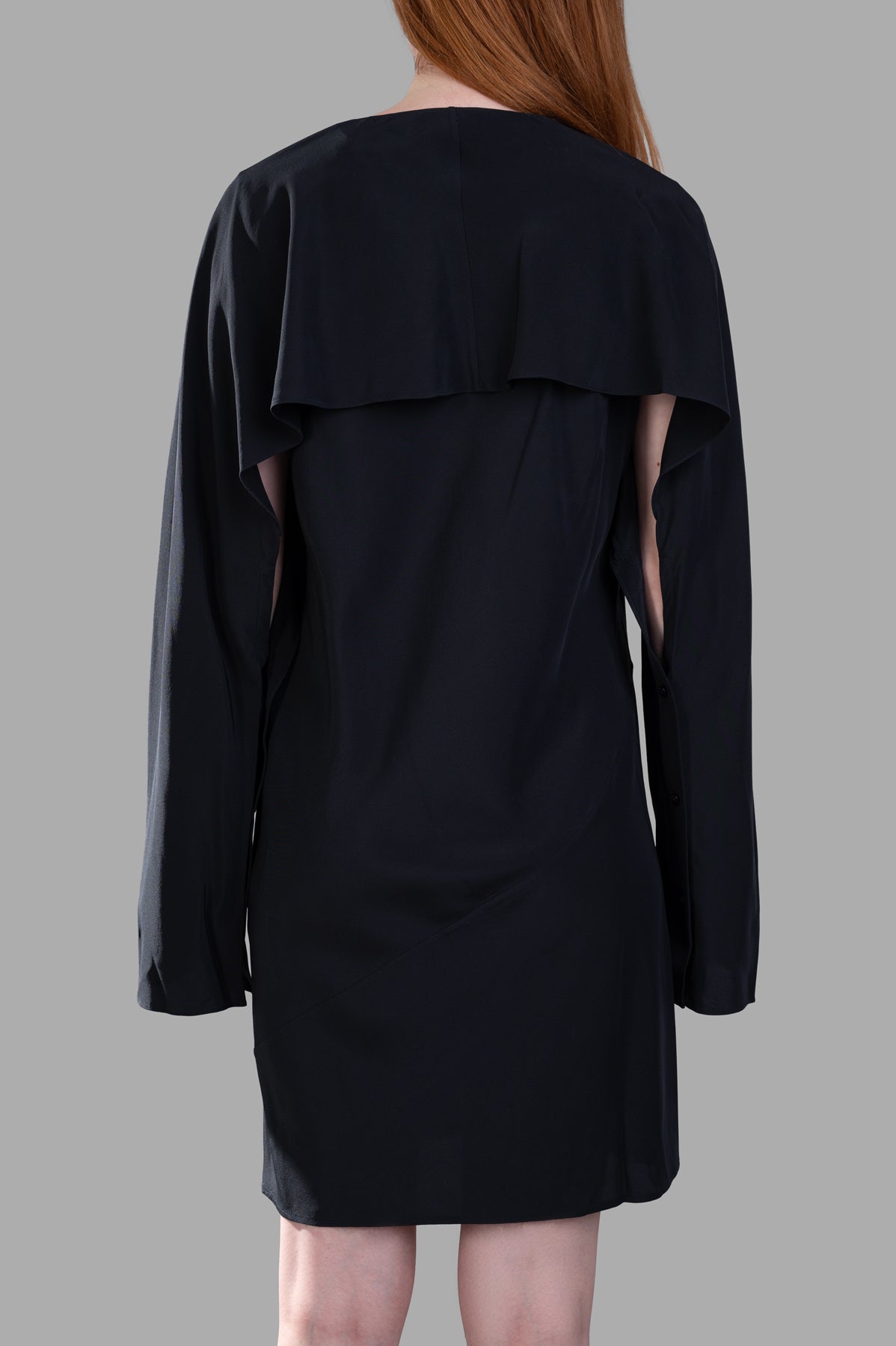 Helmut Lang Scarf Dress in black, showcasing draped sleeves and bias-cut silk crepe de chine from a back view.