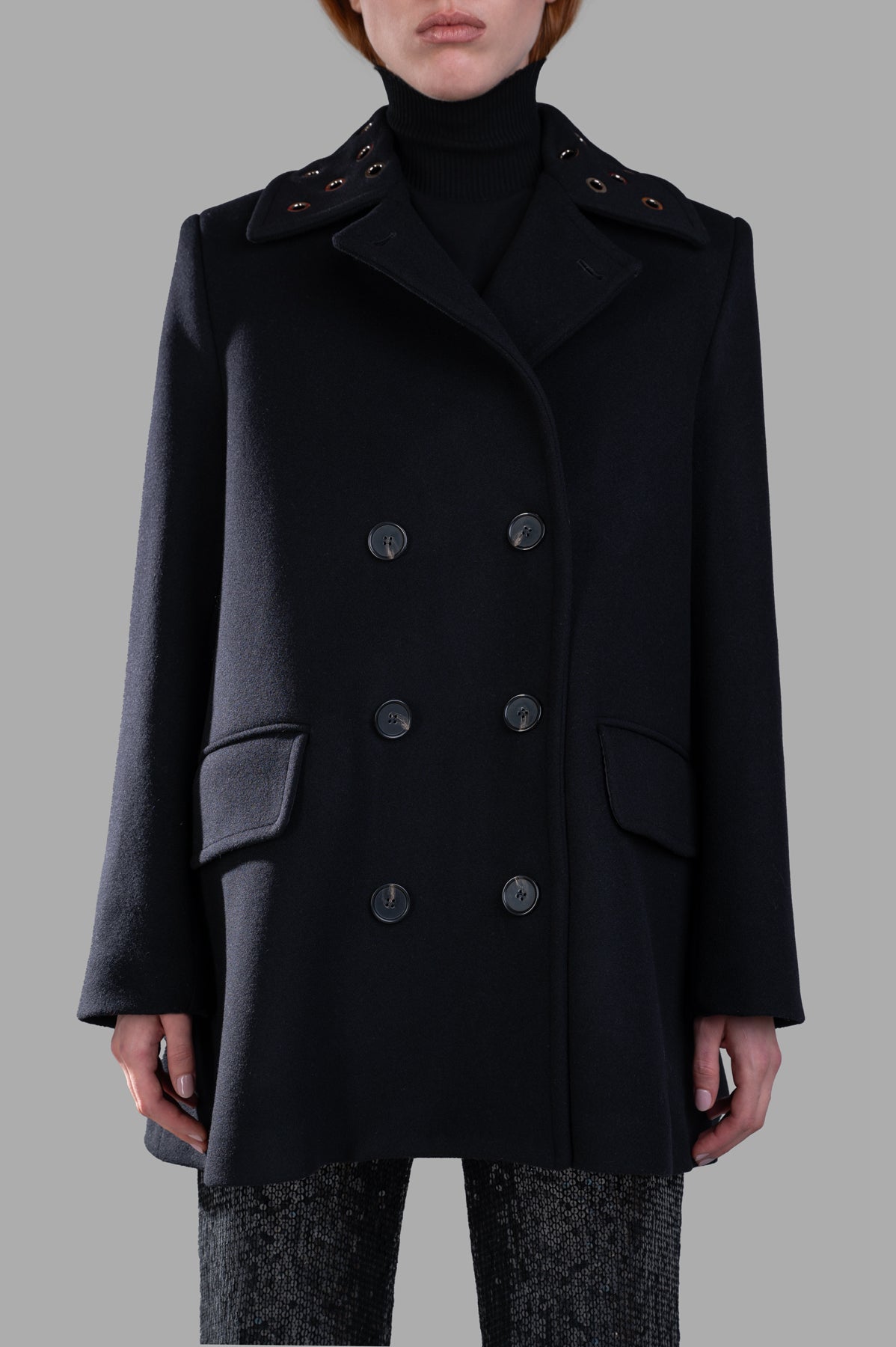 MSGM Double-breasted Coat in black, featuring a boxy silhouette, wide lapels, and side flap pockets, displayed front view.