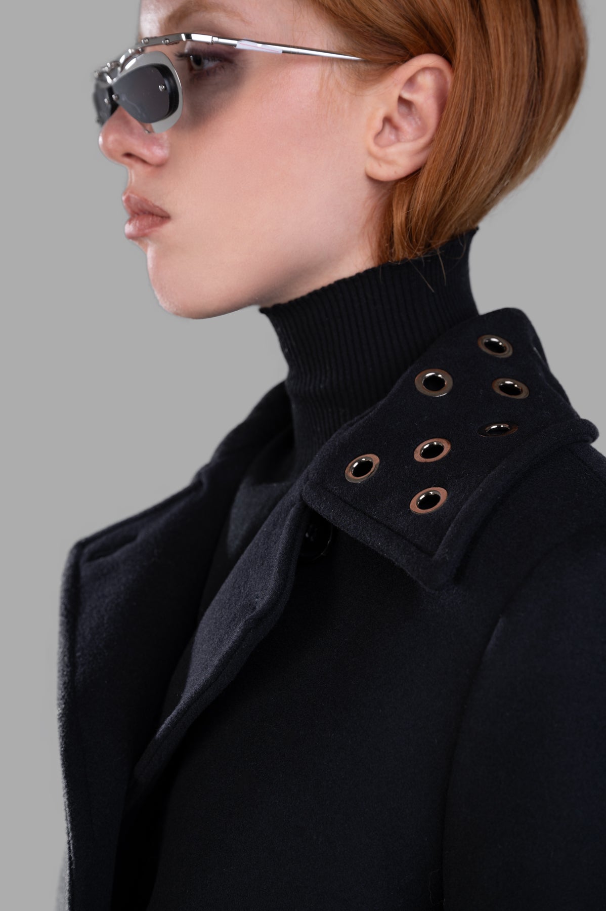 MSGM Double-breasted Coat in black, shown close-up on model highlighting boxy silhouette and stylish wide lapels.