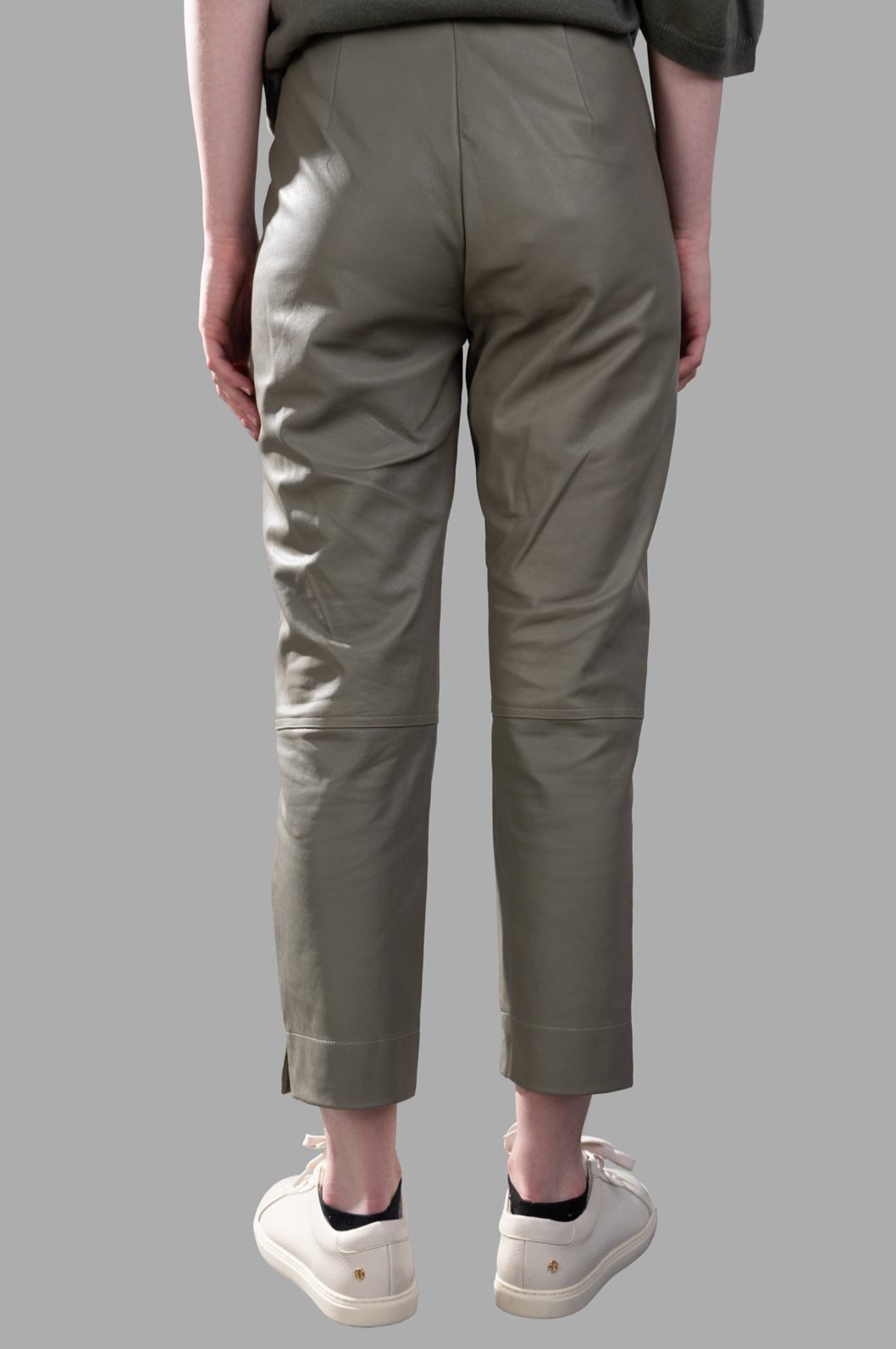 Gentry Portofino Cropped Leather Pants in olive green, showcasing a high-waist fit and stylish cropped length from the back.