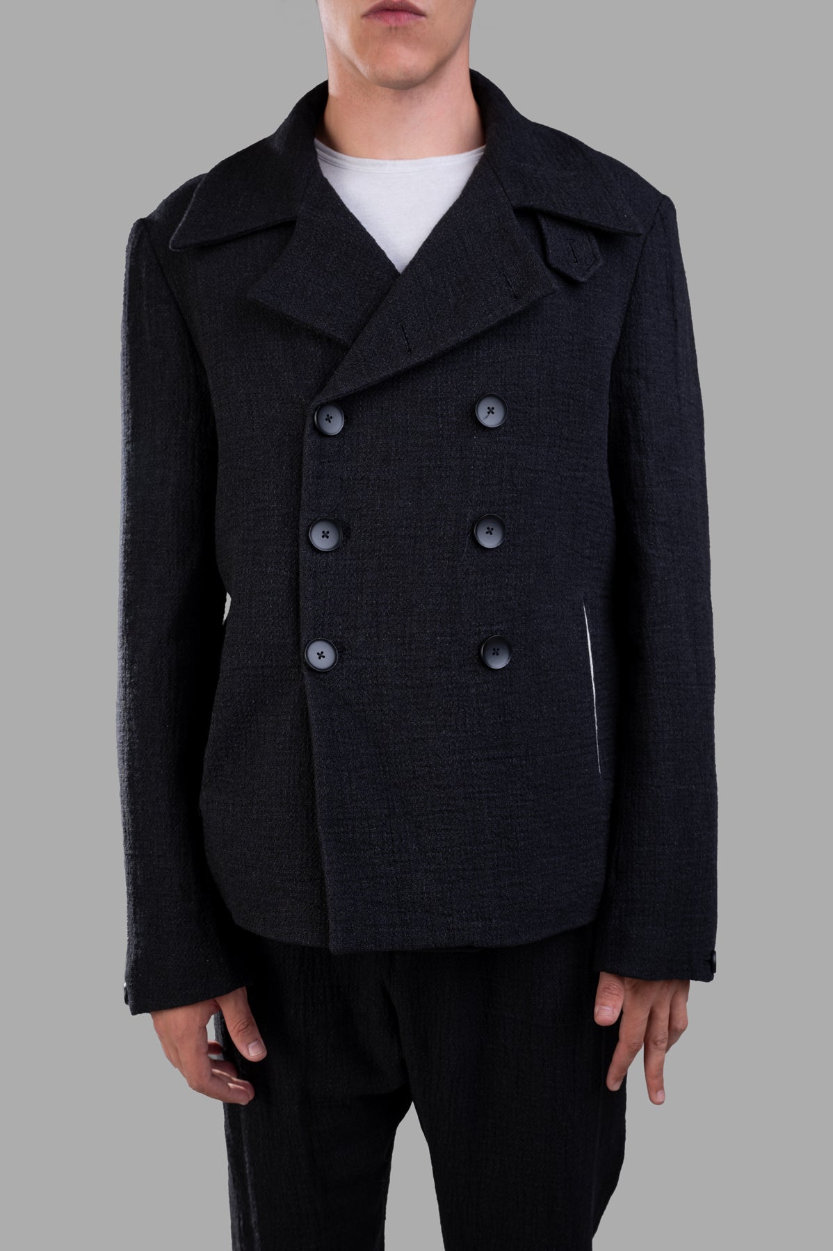 Marc Point Double-breasted Jacket displayed from the front, featuring wide lapels and textured fabric.