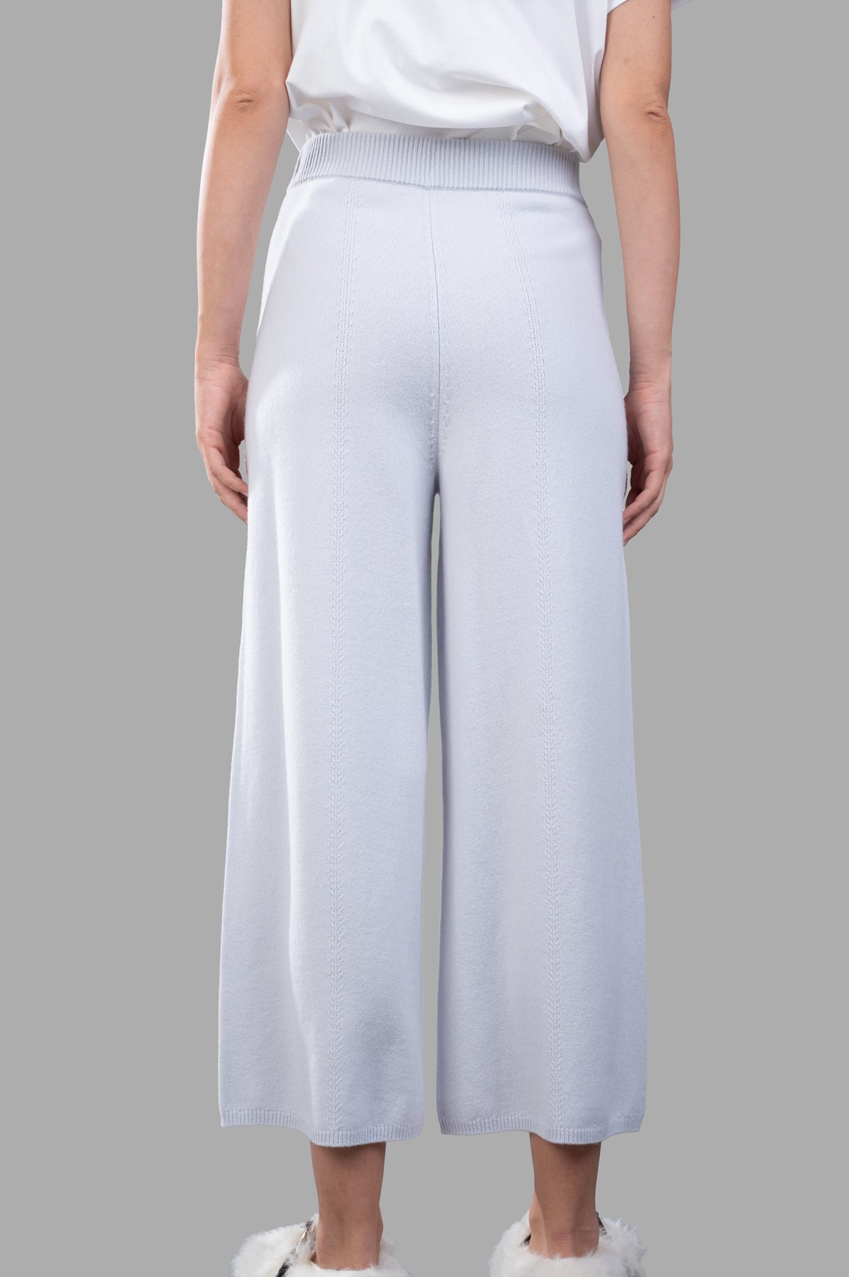 Joseph Soft Wool Culottes featuring ribbed elastic waistband, wide-leg design, and soft merino wool in light grey. Back view.