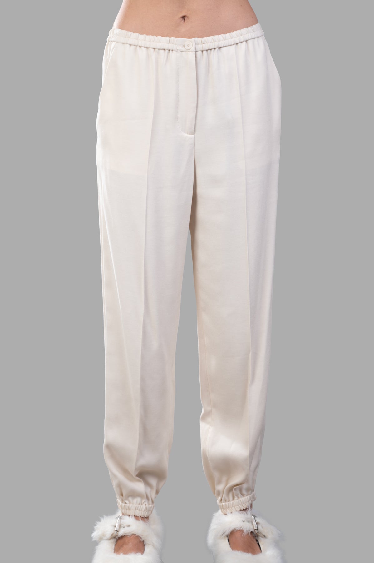 Joseph Viscose Twill Trousers feature a relaxed fit, elasticated cuffs, and a luxe ecru finish displayed on model.