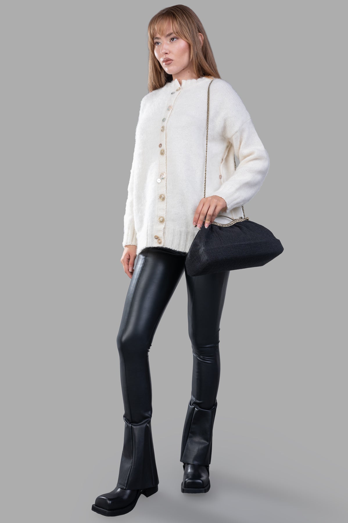 Marc Point Button-down Cardigan shown from front on model, showcasing textured fabric and stylish buttons. Image 1 of product.