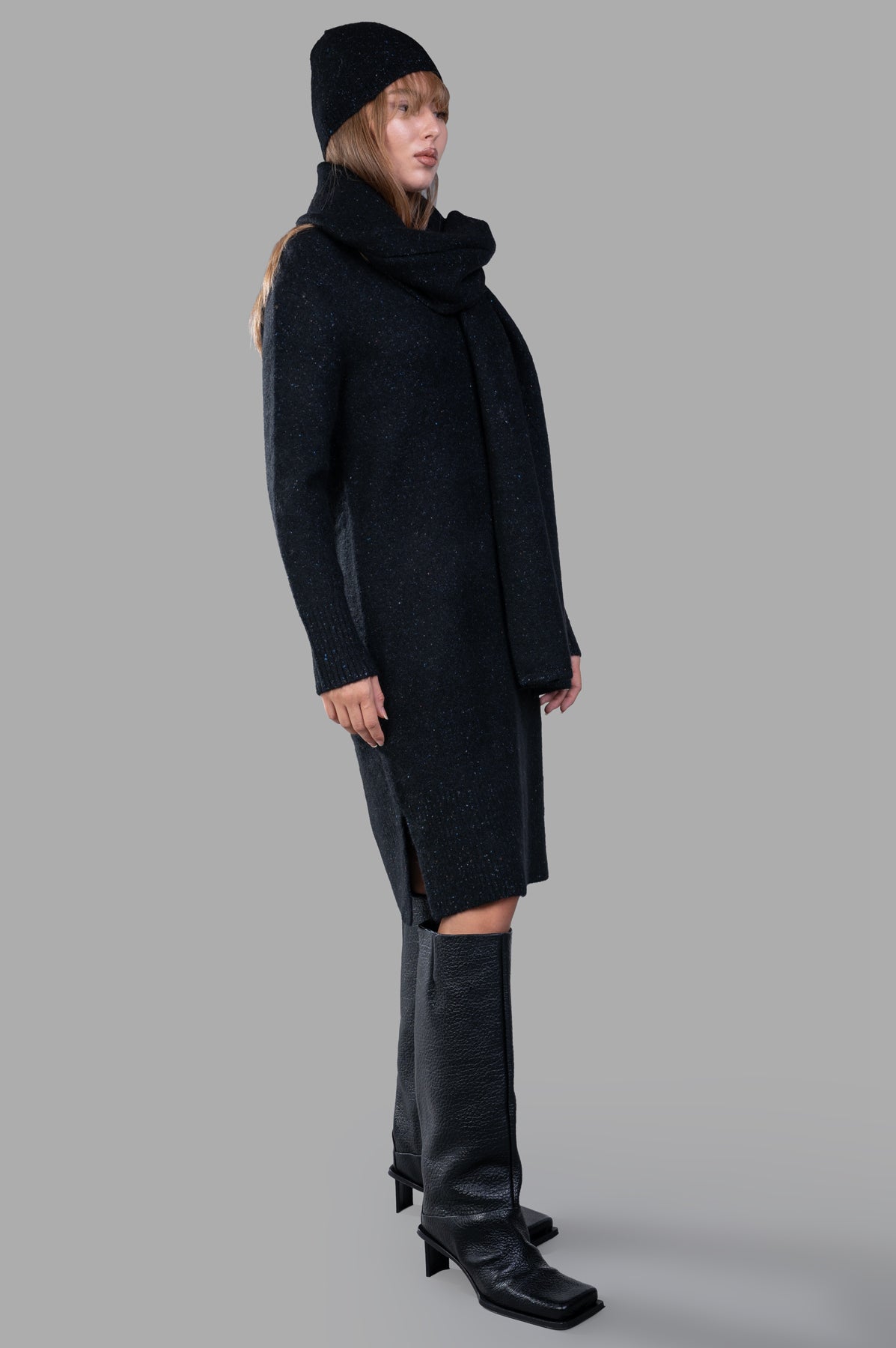 Joseph Alpaca Knit Dress, side view on-model, paired with boots and a scarf for a chic, cozy look.