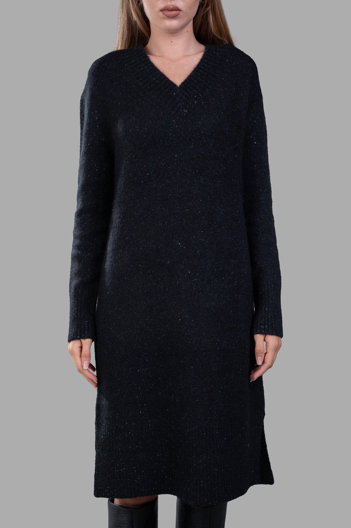 Joseph Alpaca Knit Dress in dark color, featuring a V-neck, long sleeves, and ribbed details on-model.