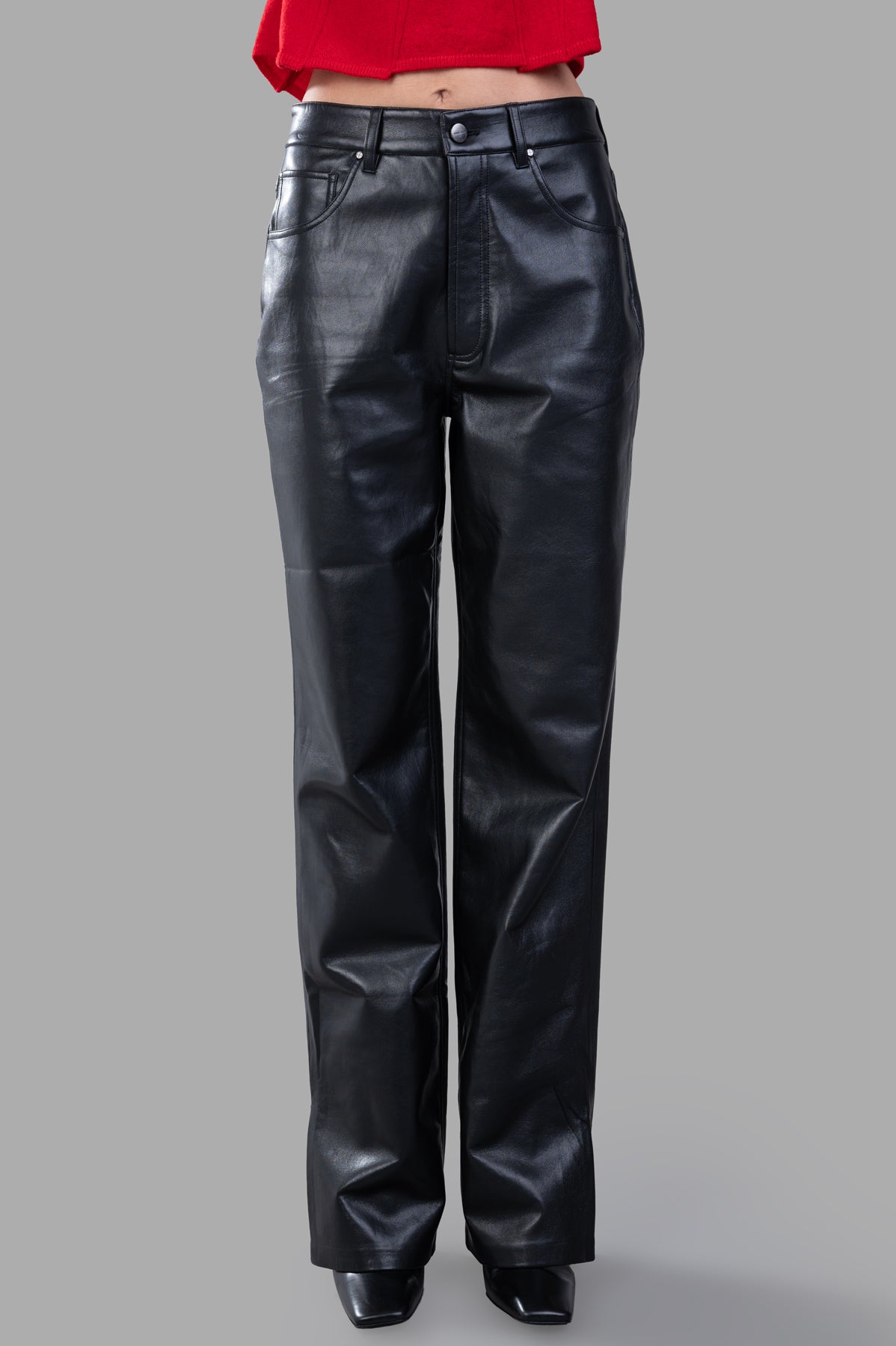 Anine Bing Roy Pants in black, featuring a boyfriend-inspired cut, midweight leather, and stylish side slits.