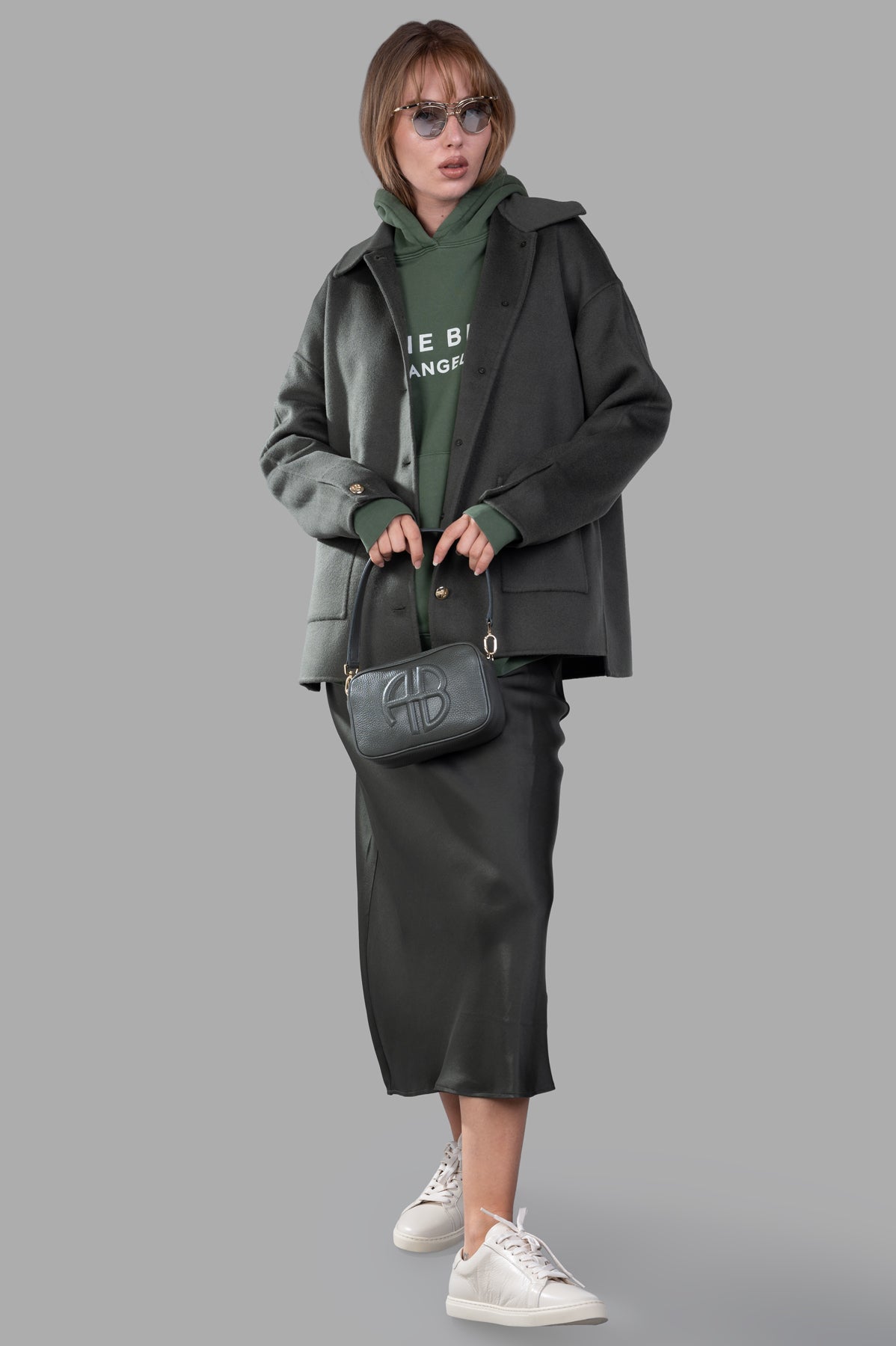 Anine Bing Luca Oversized Jacket in olive wool-cashmere, front view on model with patch pockets and gold button details.