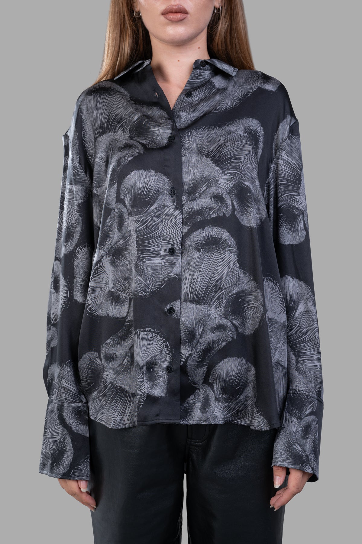 Anine Bing Avalon Shirt featuring a floral design, displayed on model from the front with button details and long sleeves.
