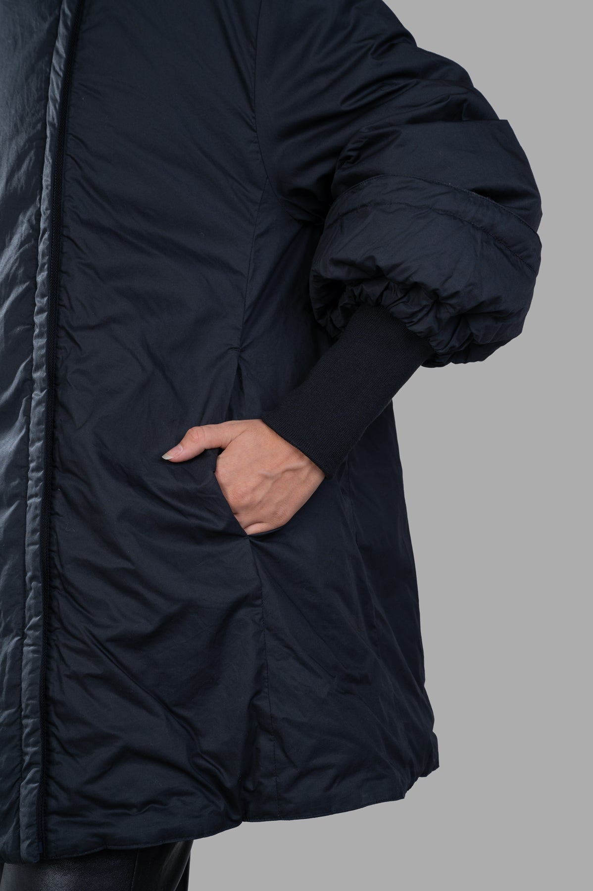 By Malene Birger Sallimo Padded Coat, detail view showing voluminous silhouette and side pocket, crafted from recycled.