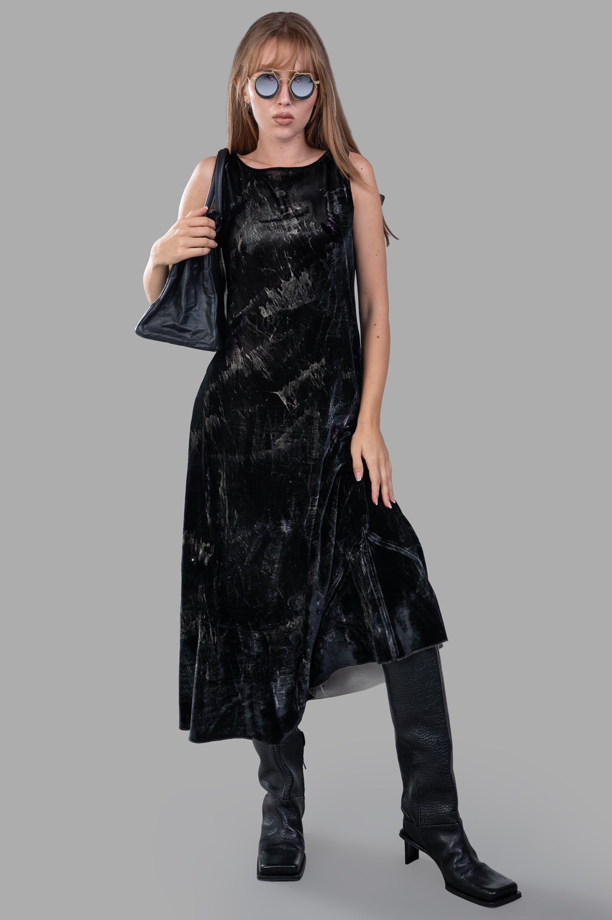 Avant Toi sleeveless black Velvet Maxi Dress on model, featuring a bohemian print and luxurious velvet fabric.