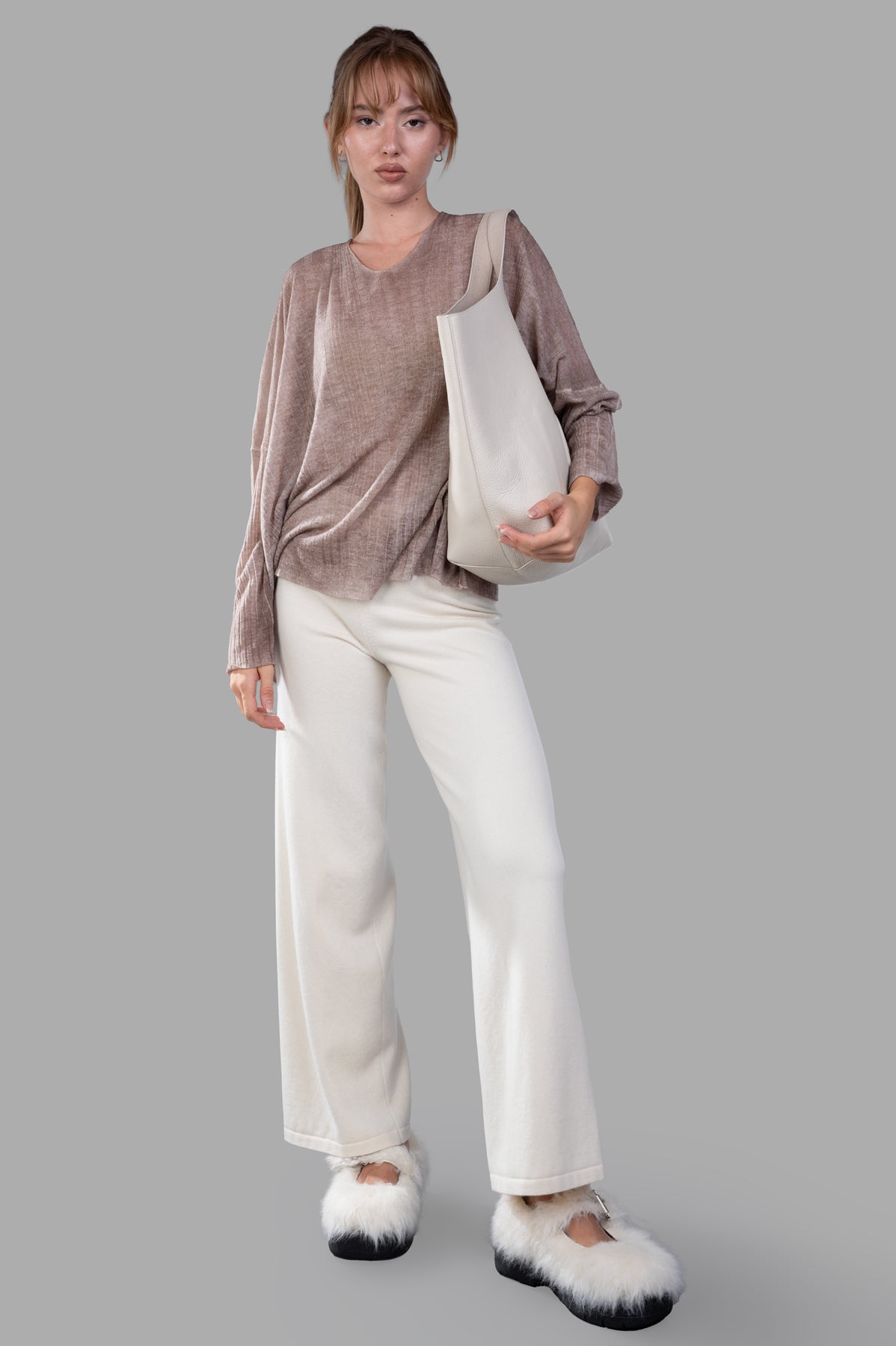 Avant Toi Ribbed Oversized Sweater in beige, front view on-model, featuring round neckline and dropped shoulders.