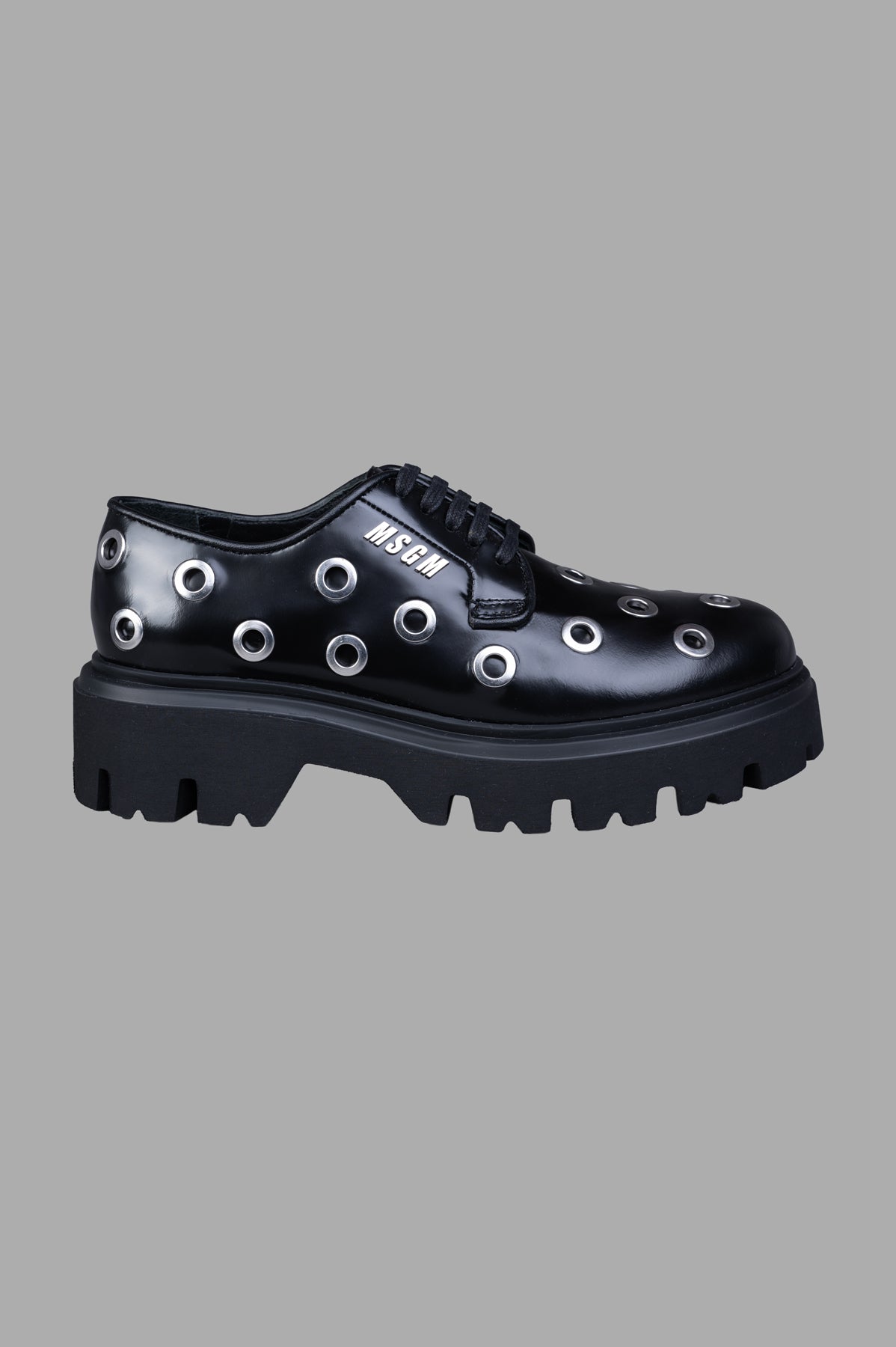 MSGM black Studded Oxford Shoes, side view, leather with metal studs, lace-up design, rubber outsole.