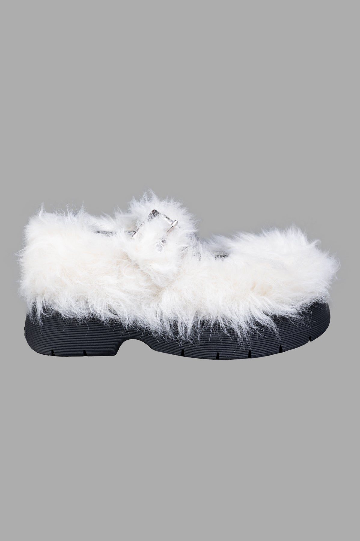 MSGM Faux-fur Buckled Shoes, side view showing ivory white texture with silver buckle and black sole.
