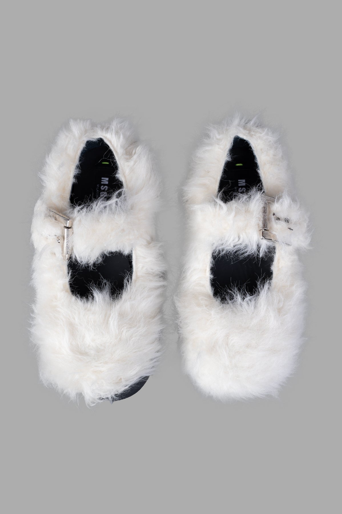 MSGM Faux-fur Buckled Shoes in elegant ivory white, featuring a pointed toe and silver-tone buckle detail.