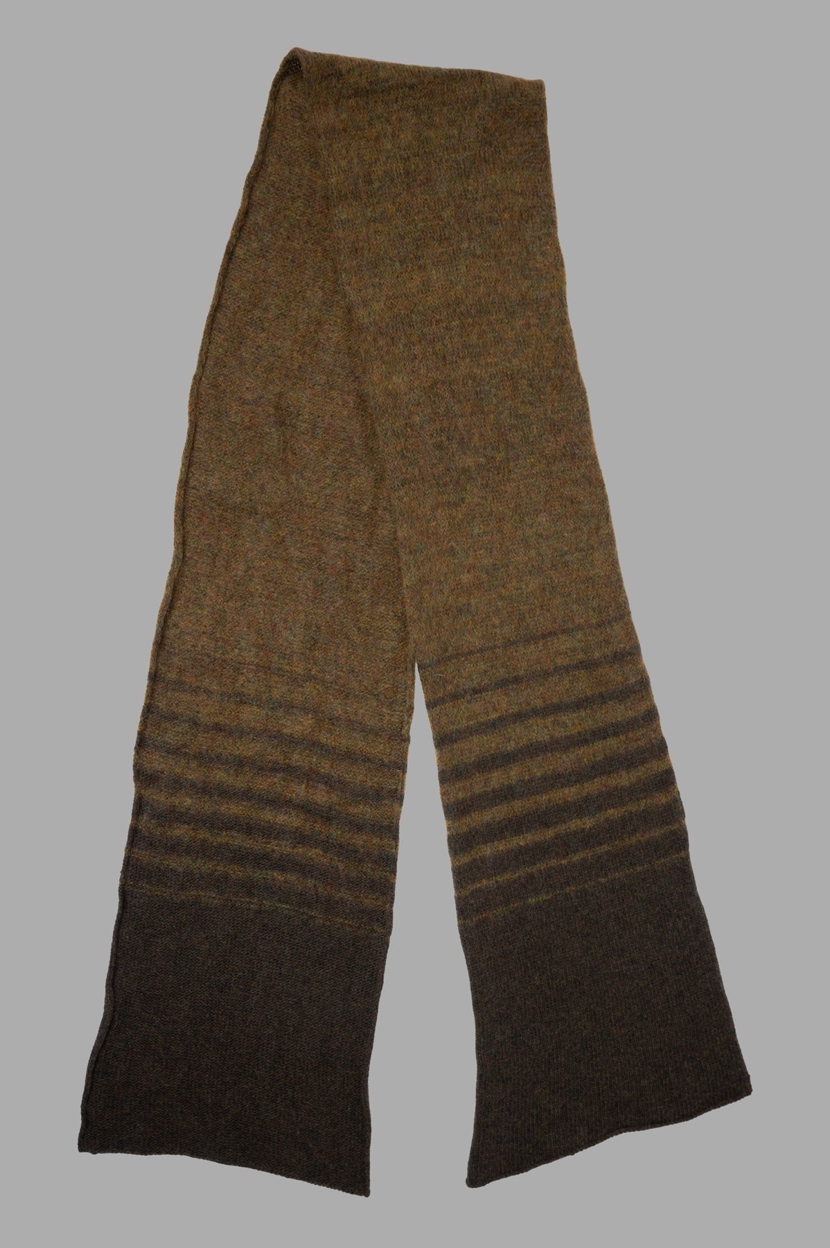 Masnada Striped Scarf showcasing a soft wool blend, featuring a horizontal stripe design in earthy tones. Ideal for warmth.