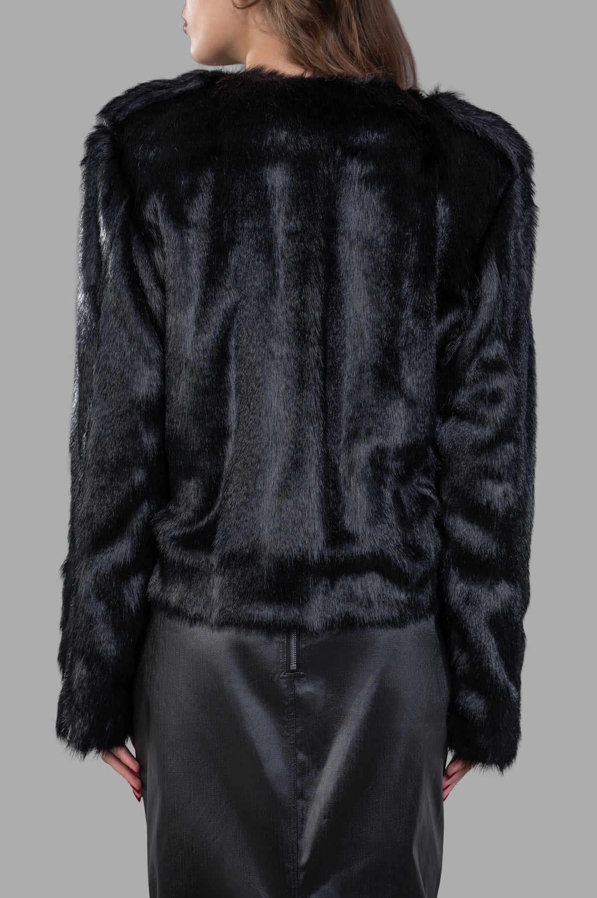 Alabama Muse Faux-fur Jacket in black, showcasing soft texture and sustainable design from the back on-model.
